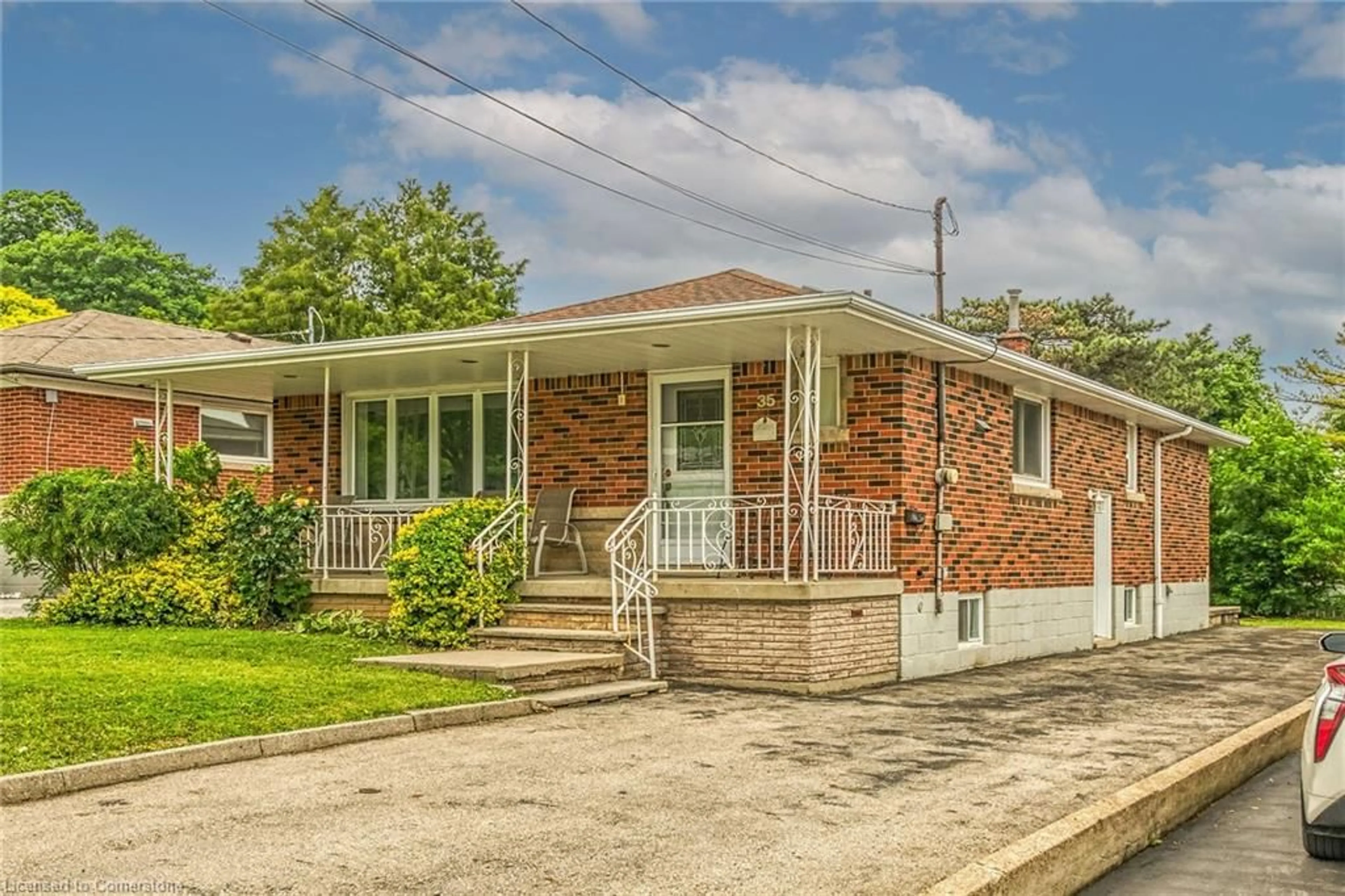 Home with brick exterior material, street for 35 Greenhill Ave, Hamilton Ontario L8K 5C5