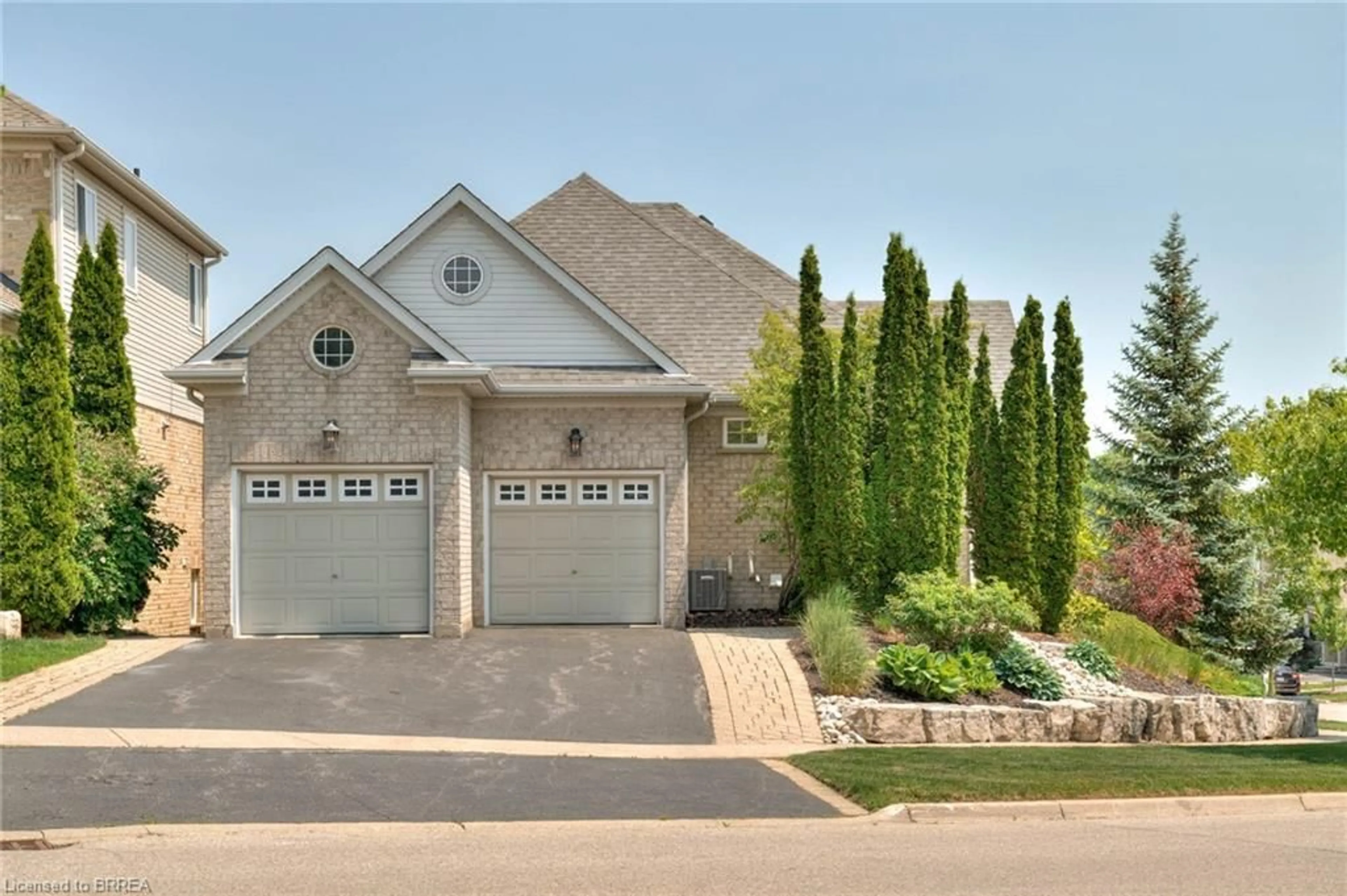 Home with brick exterior material, street for 330 Pine Valley Dr, Kitchener Ontario N2P 2V5