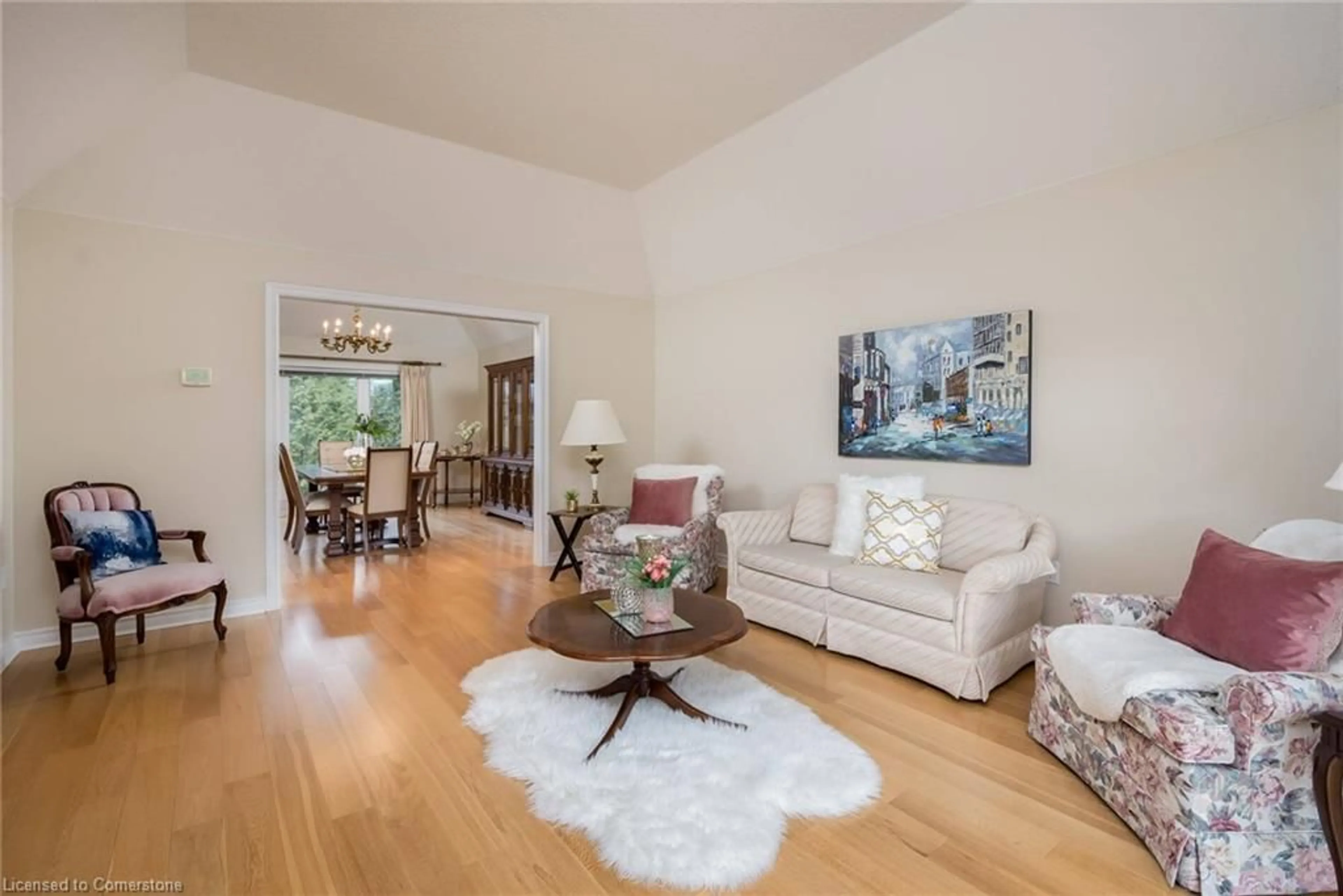 Living room with furniture, wood/laminate floor for 4011 Lantern Lane, Burlington Ontario L7L 5Z2