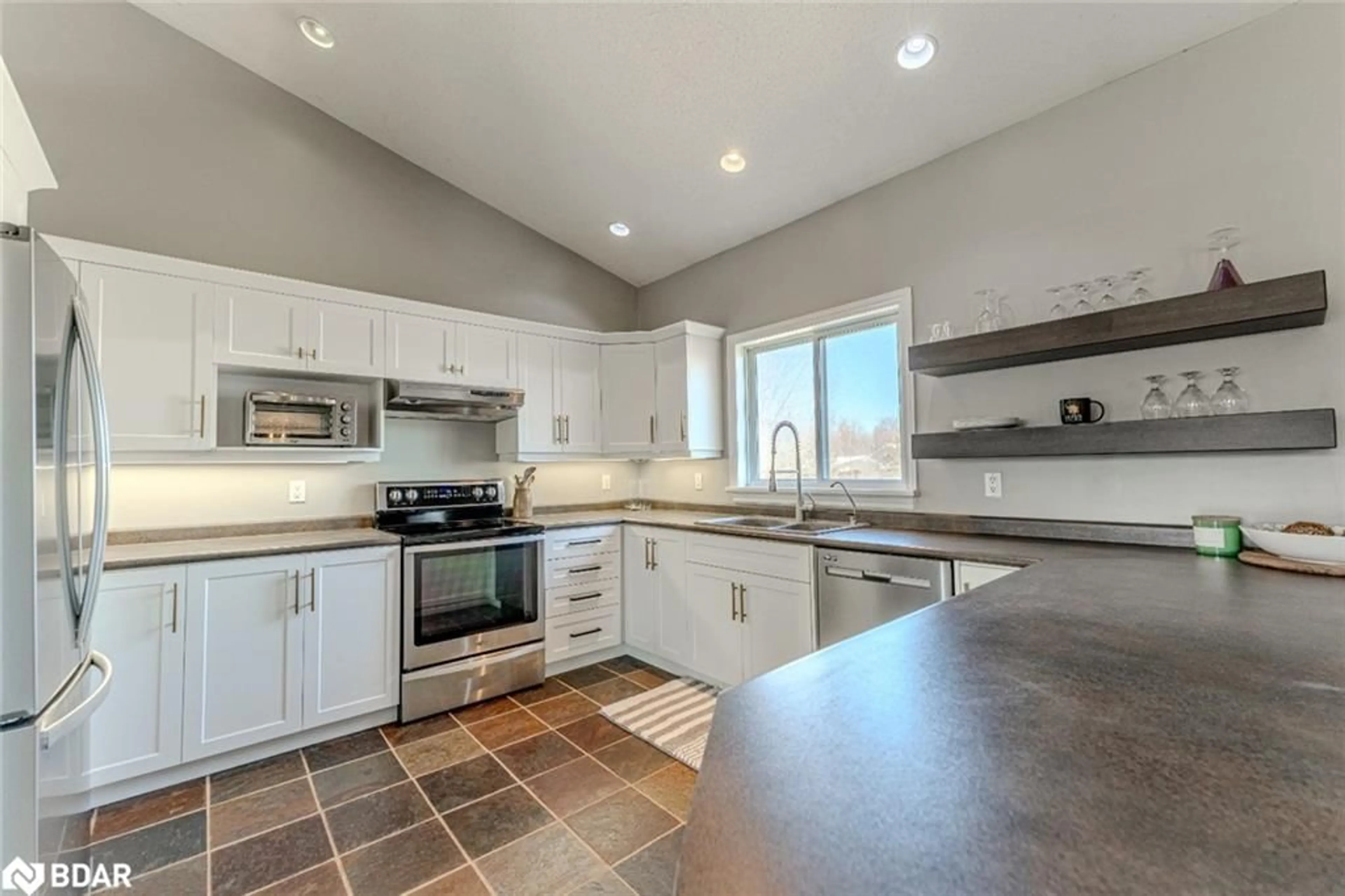 Open concept kitchen, ceramic/tile floor for 3705 County Road 124, Nottawa Ontario L0M 1P0