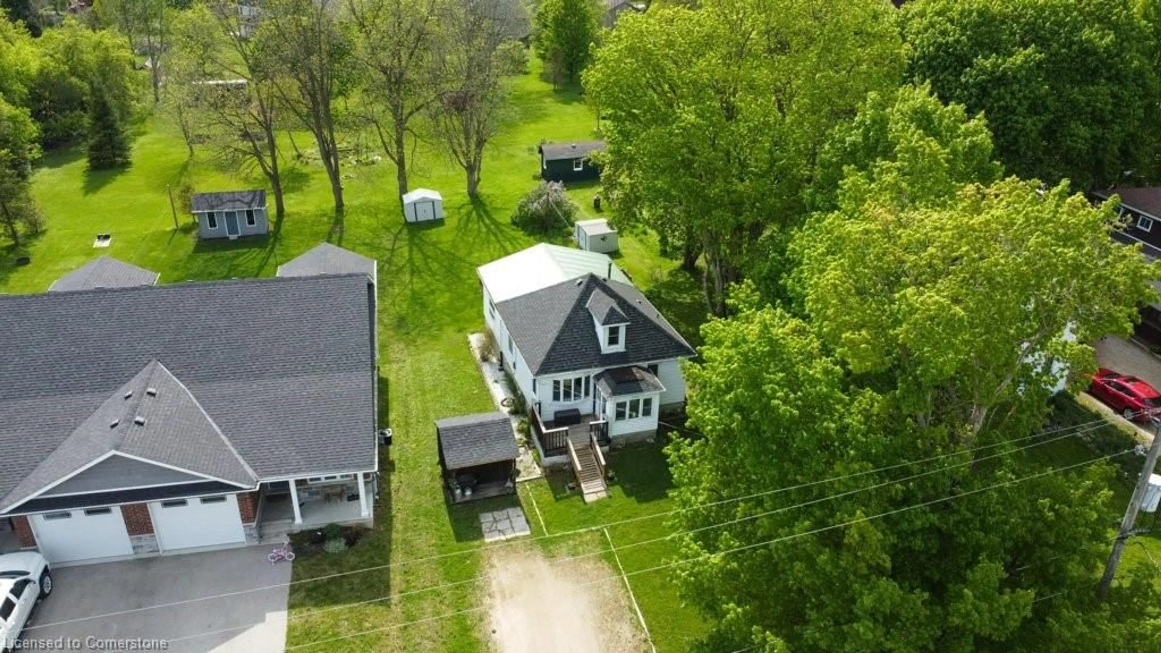 A pic from outside/outdoor area/front of a property/back of a property/a pic from drone, street for 248 Bruce St, West Grey Ontario N0G 1R0