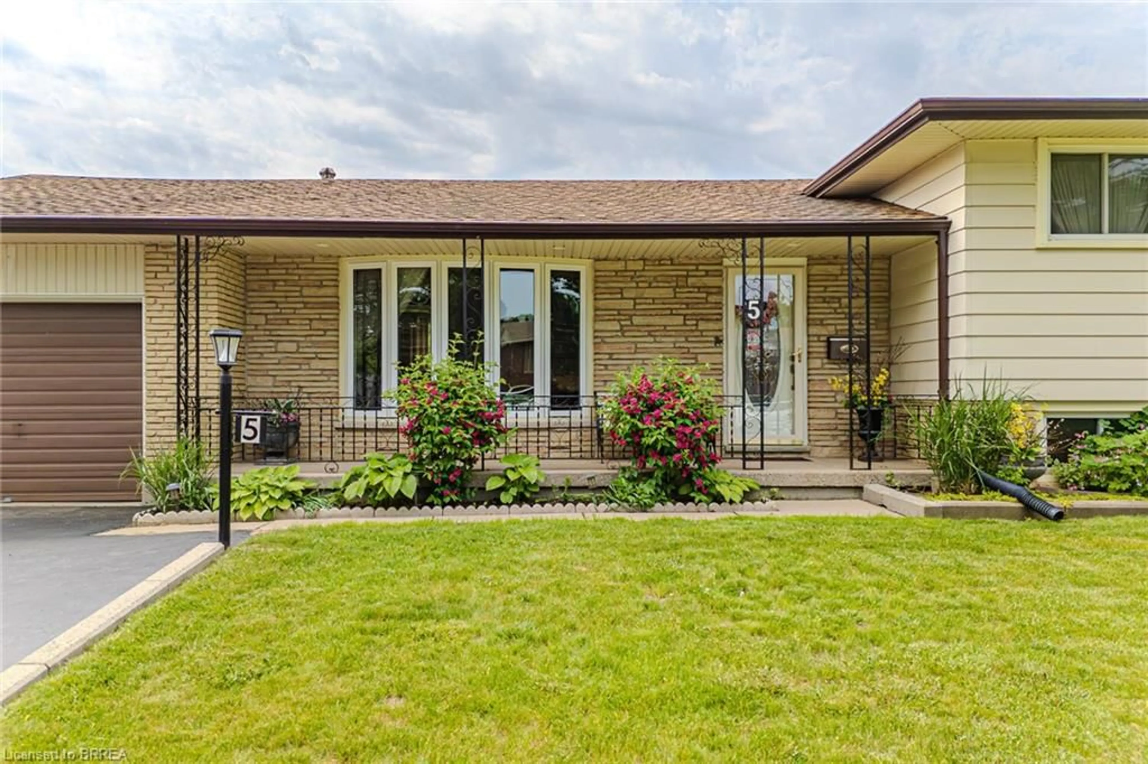 Home with brick exterior material, street for 5 Pippin Dr, Brantford Ontario N3R 5V8
