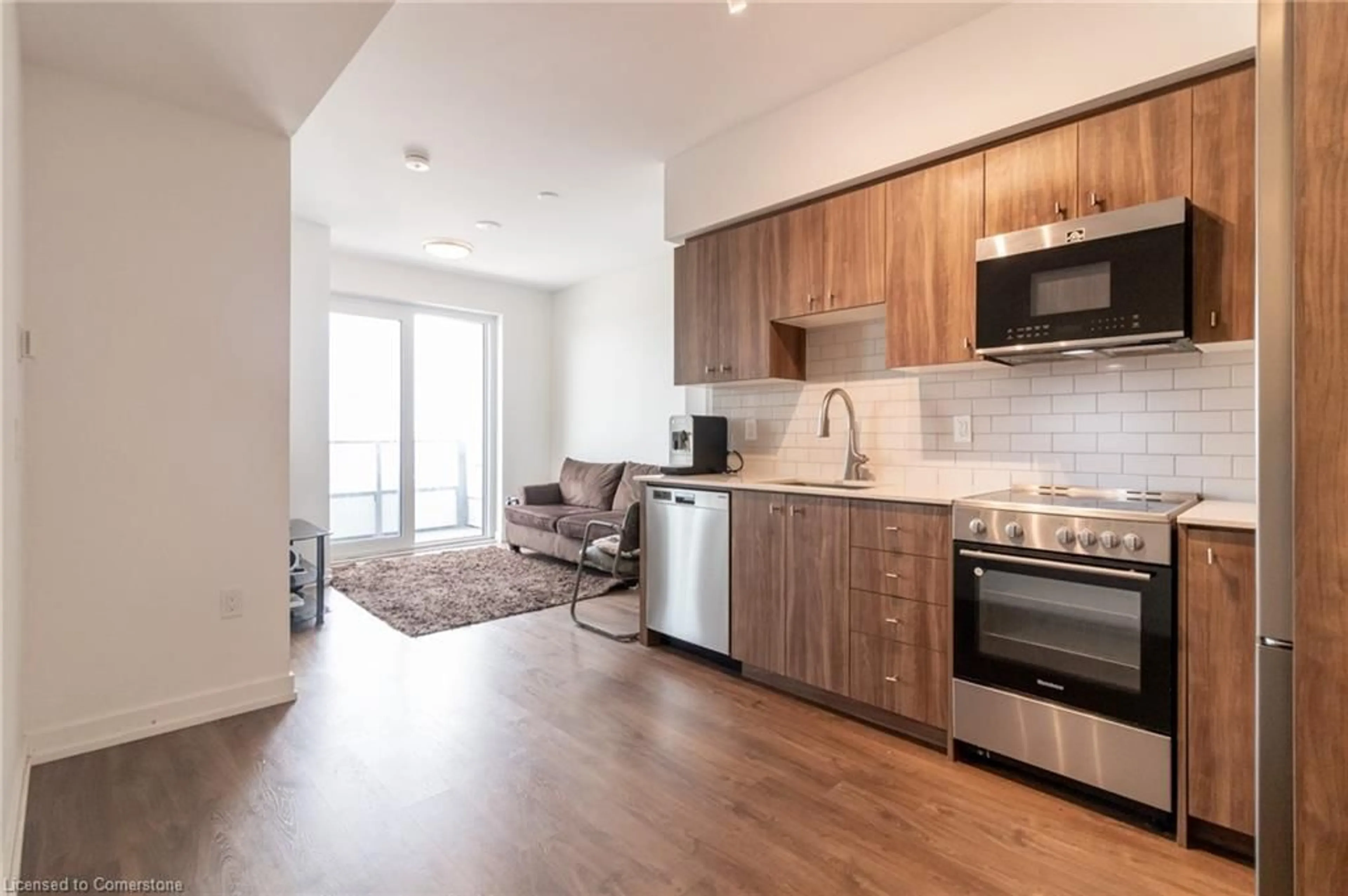 Open concept kitchen, wood/laminate floor for 15 Wellington St #2804, Kitchener Ontario N2G 0E4