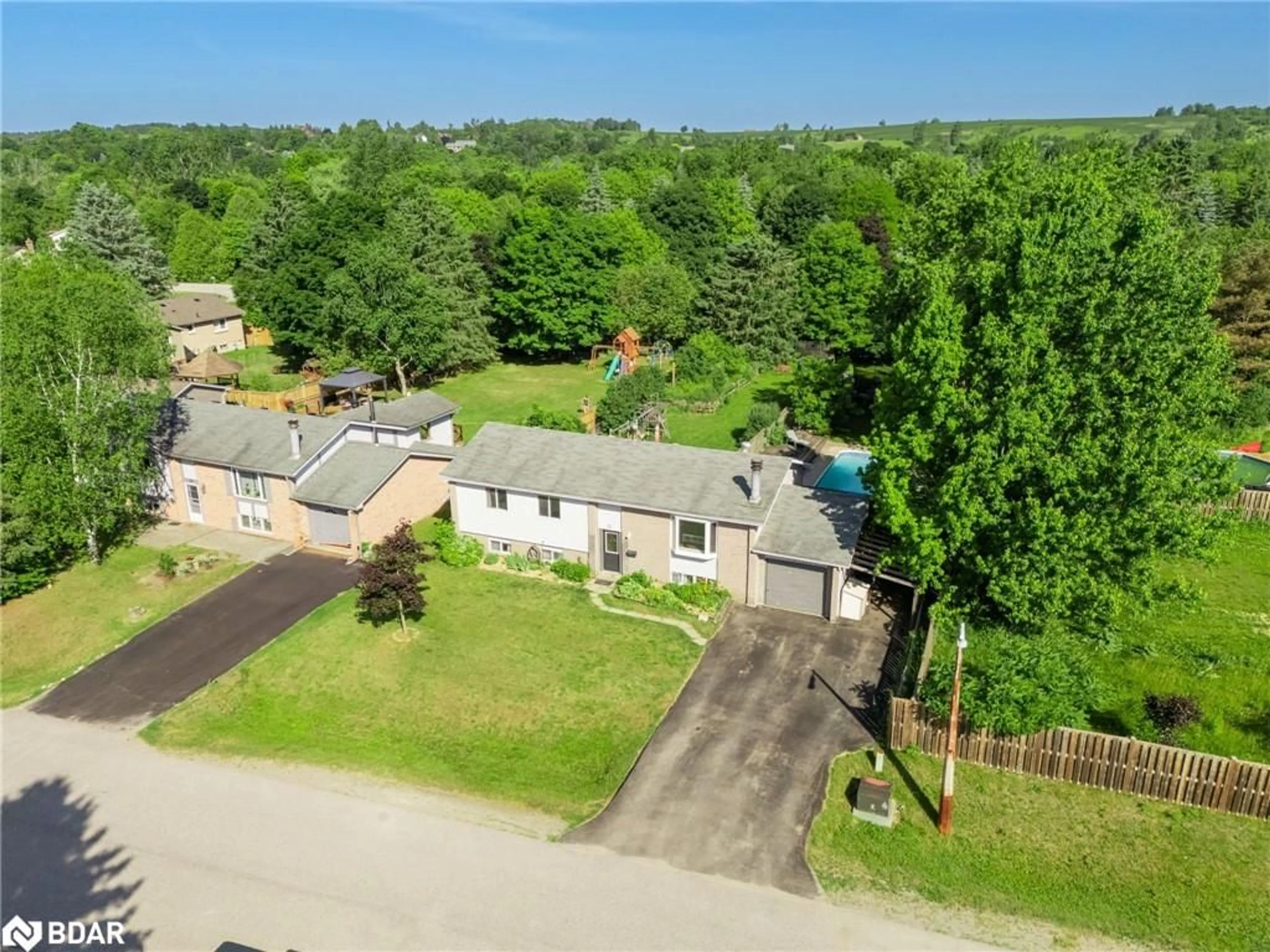 A pic from outside/outdoor area/front of a property/back of a property/a pic from drone, street for 22 Douglas Cres, Hillsburgh Ontario N0B 1Z0