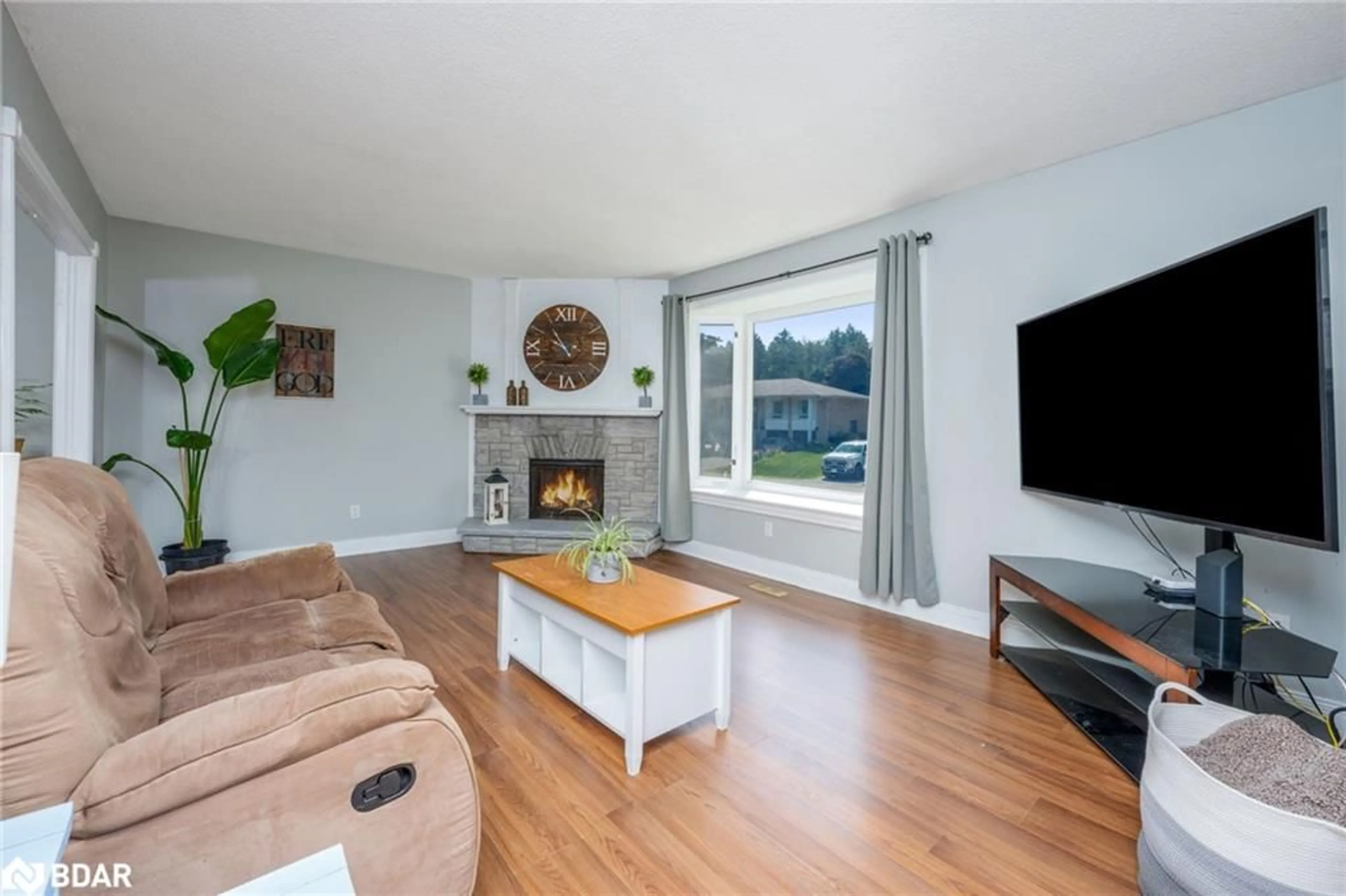 Living room with furniture, wood/laminate floor for 22 Douglas Cres, Hillsburgh Ontario N0B 1Z0