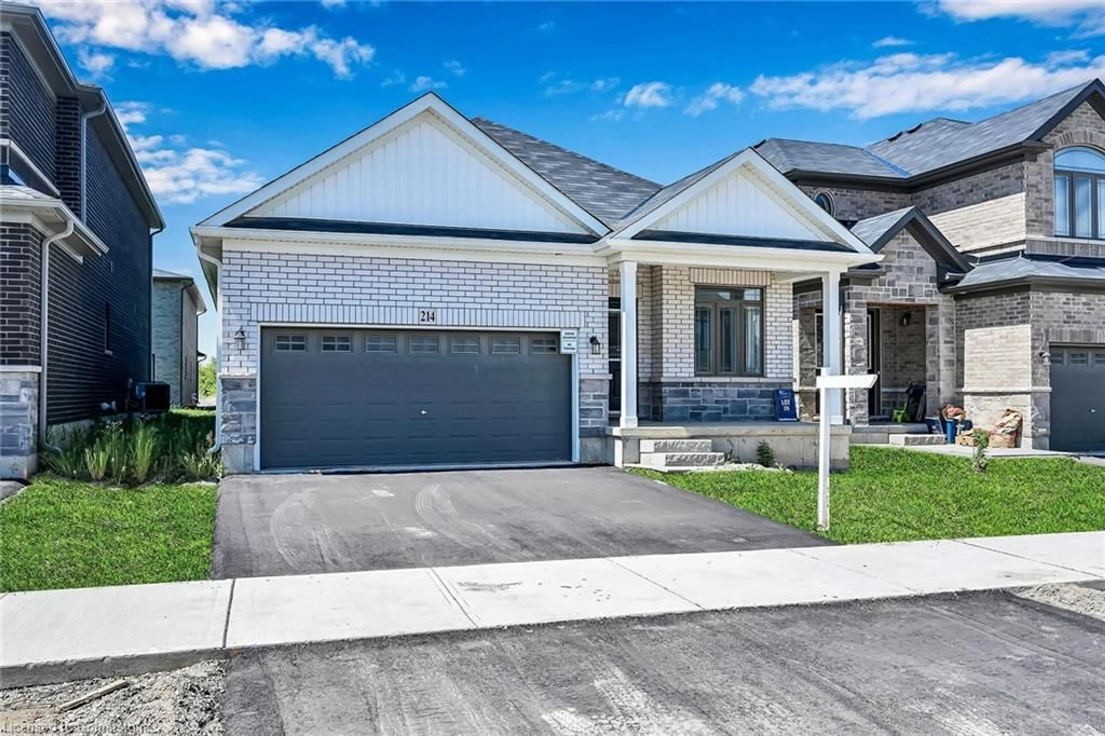 Home with brick exterior material, street for 214 Long Boat Run West, Brantford Ontario N3T 0T2