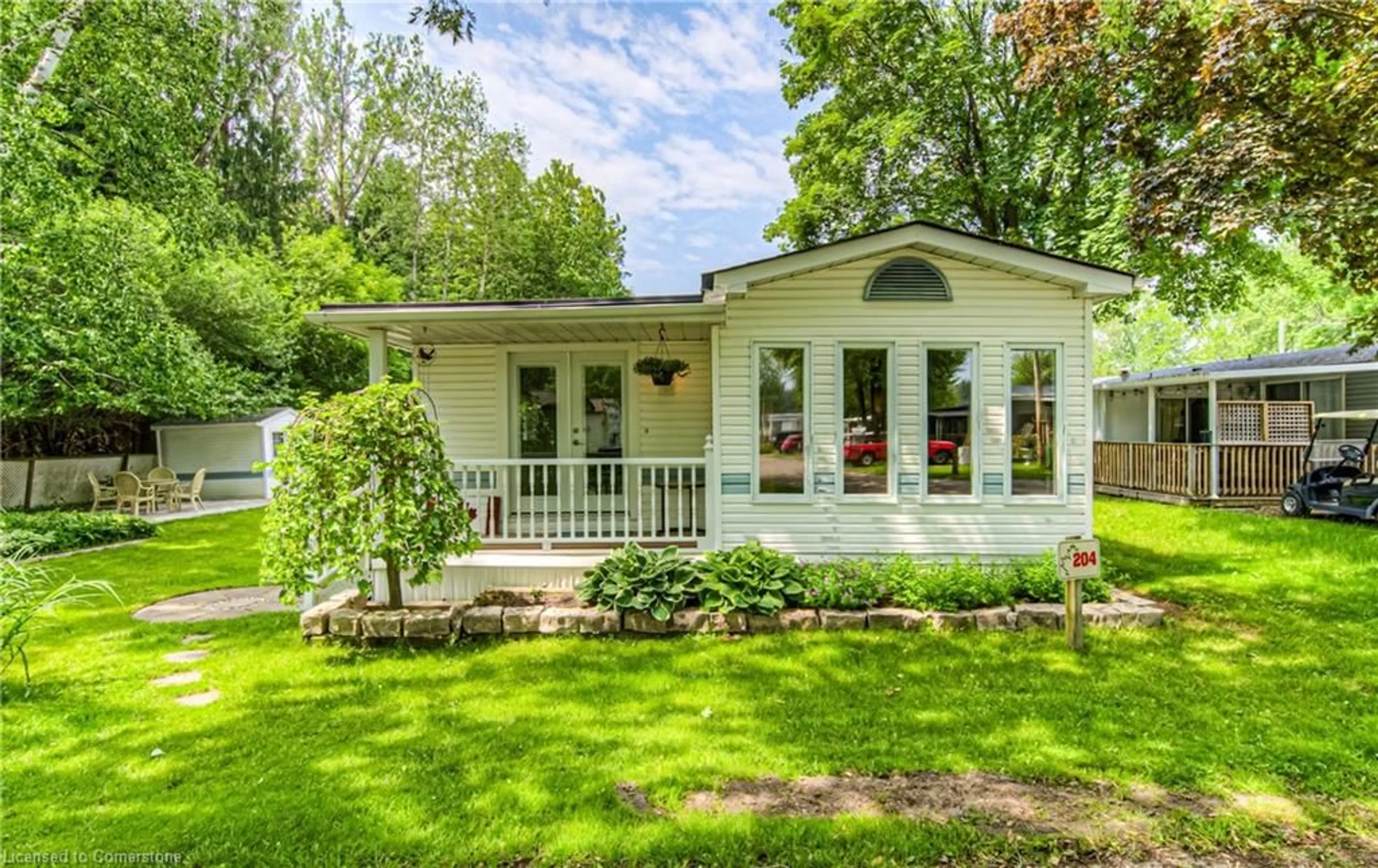 Home with vinyl exterior material, street for 580 Beaver Creek Rd #204, Waterloo Ontario N2J 3Z4