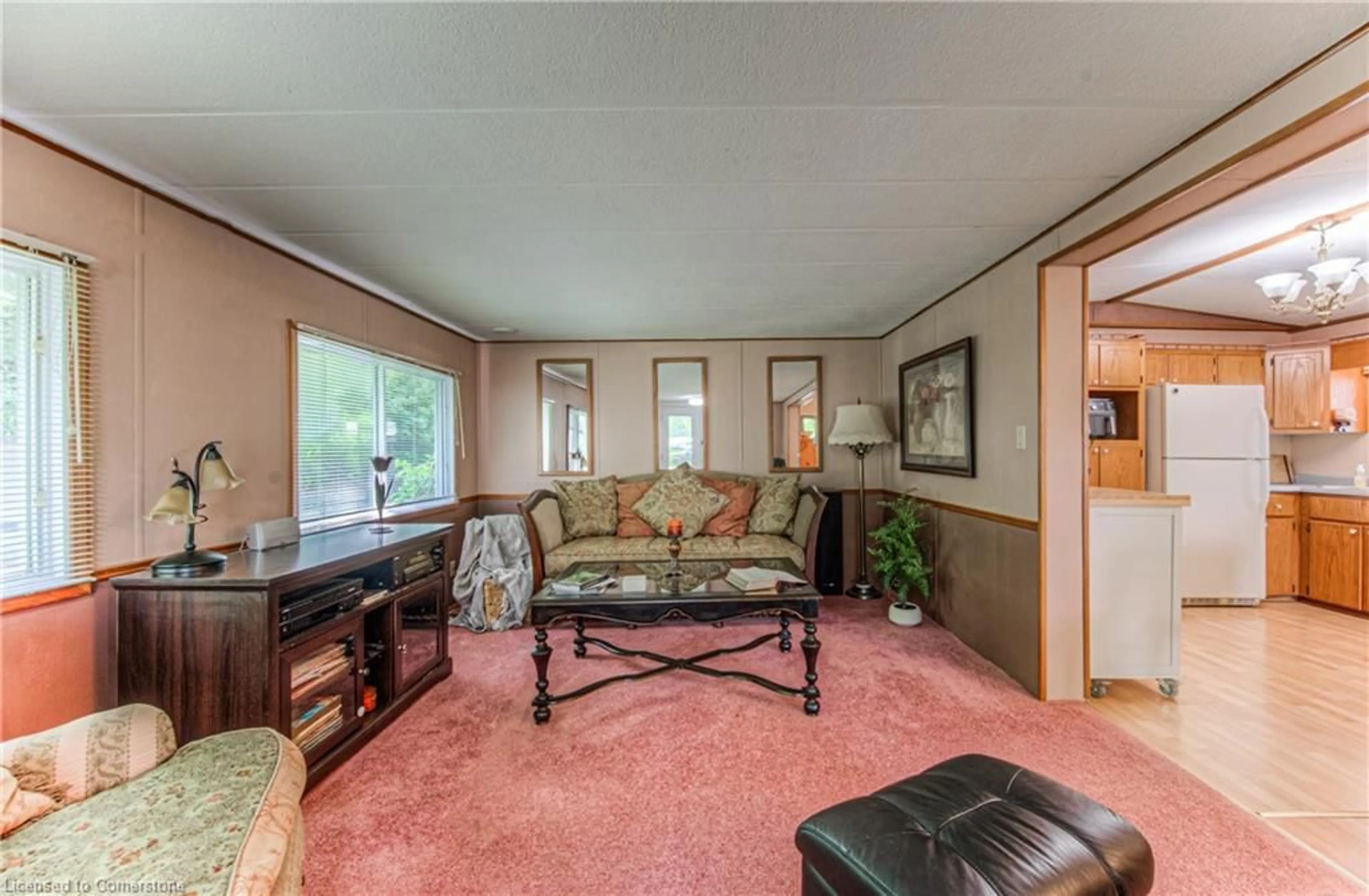 Living room with furniture, carpet floor for 580 Beaver Creek Rd #204, Waterloo Ontario N2J 3Z4