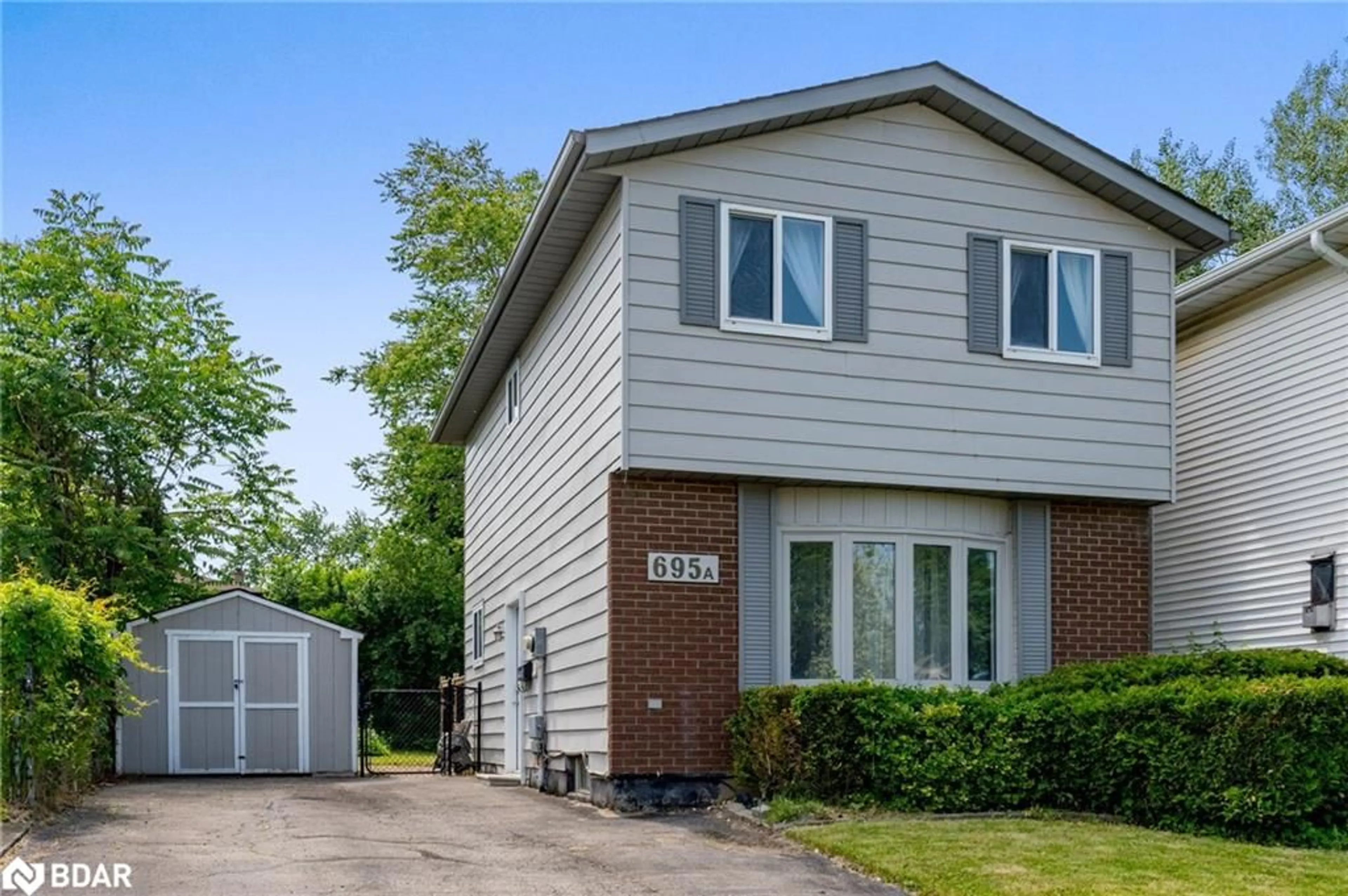 Home with vinyl exterior material, street for 695A Highpoint Ave #A, Waterloo Ontario N2Z 1G8