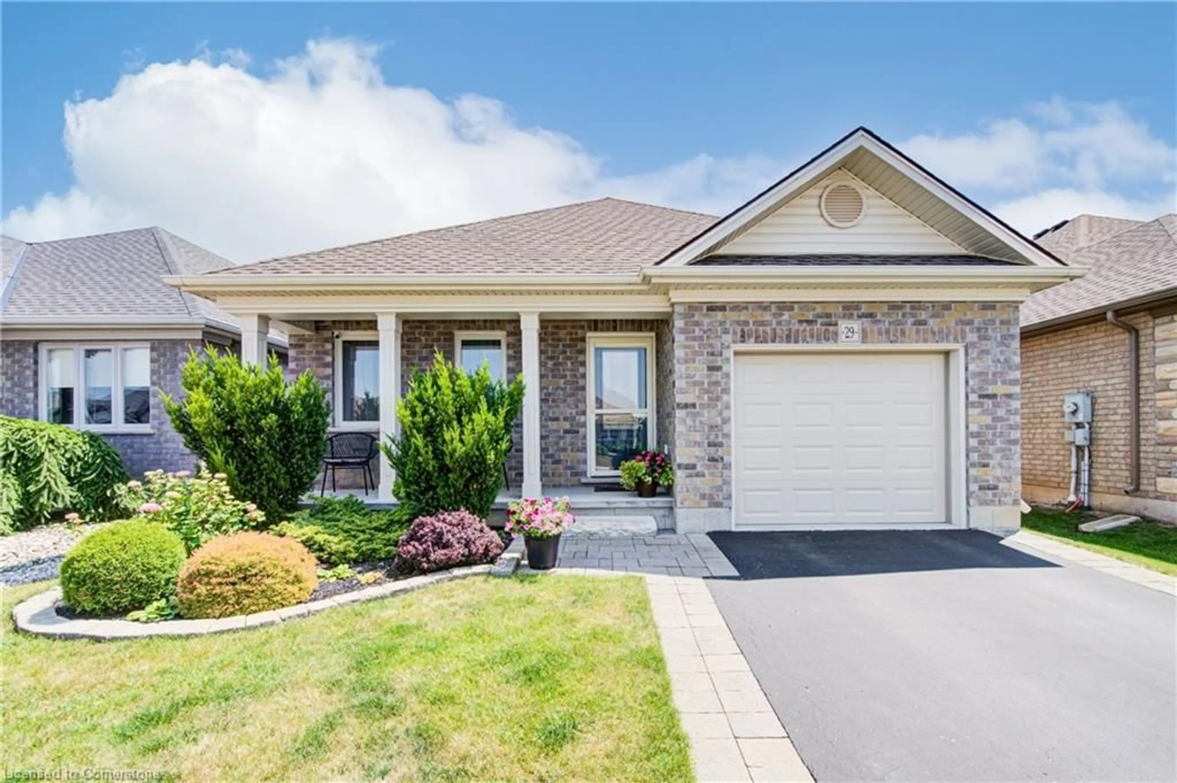 Home with brick exterior material, street for 29 Esseltine Drive Dr, Tillsonburg Ontario N4G 0G2
