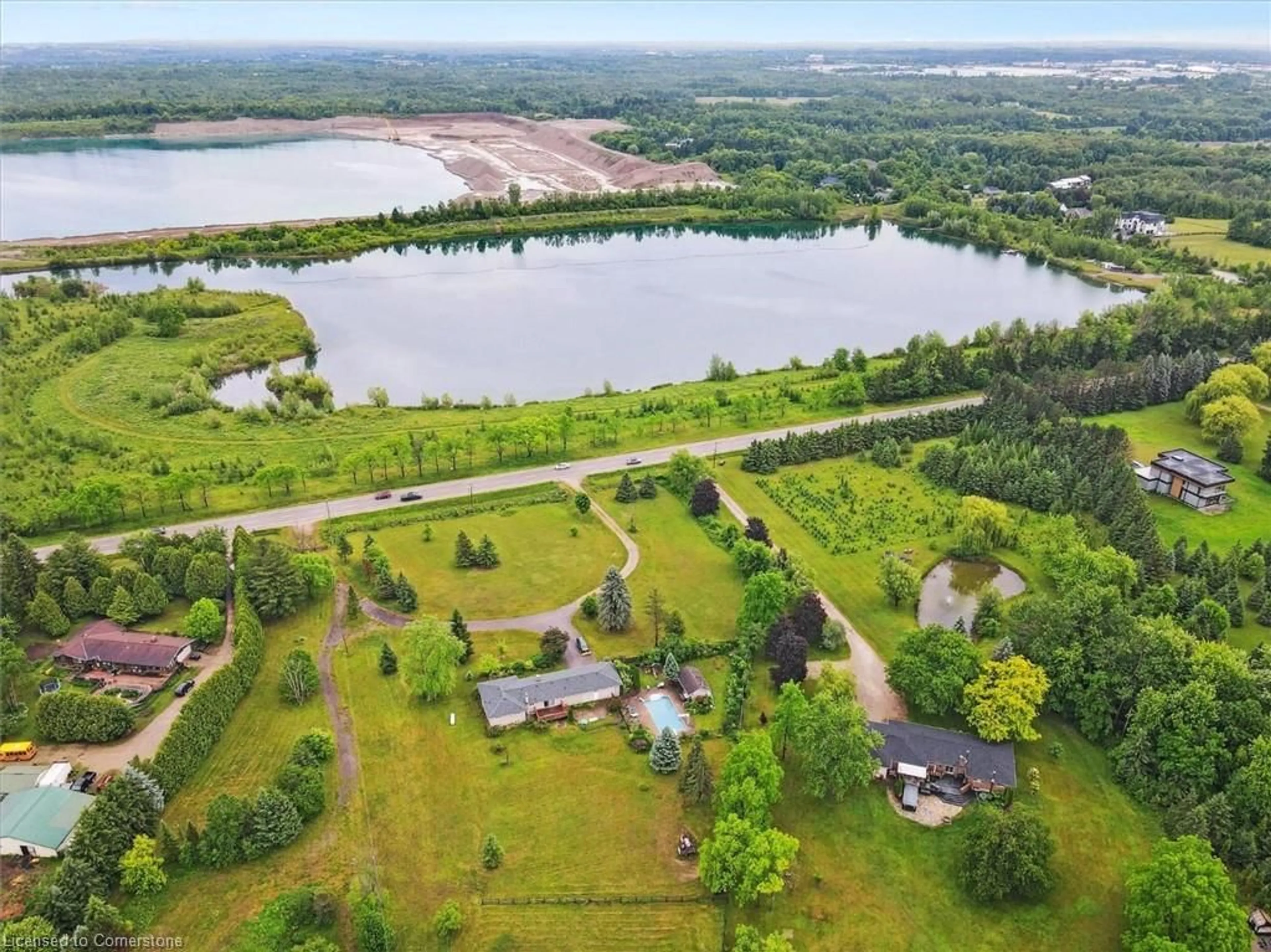 A pic from outside/outdoor area/front of a property/back of a property/a pic from drone, water/lake/river/ocean view for 7648 Wellington Rd 34, Puslinch Ontario N0B 2J0
