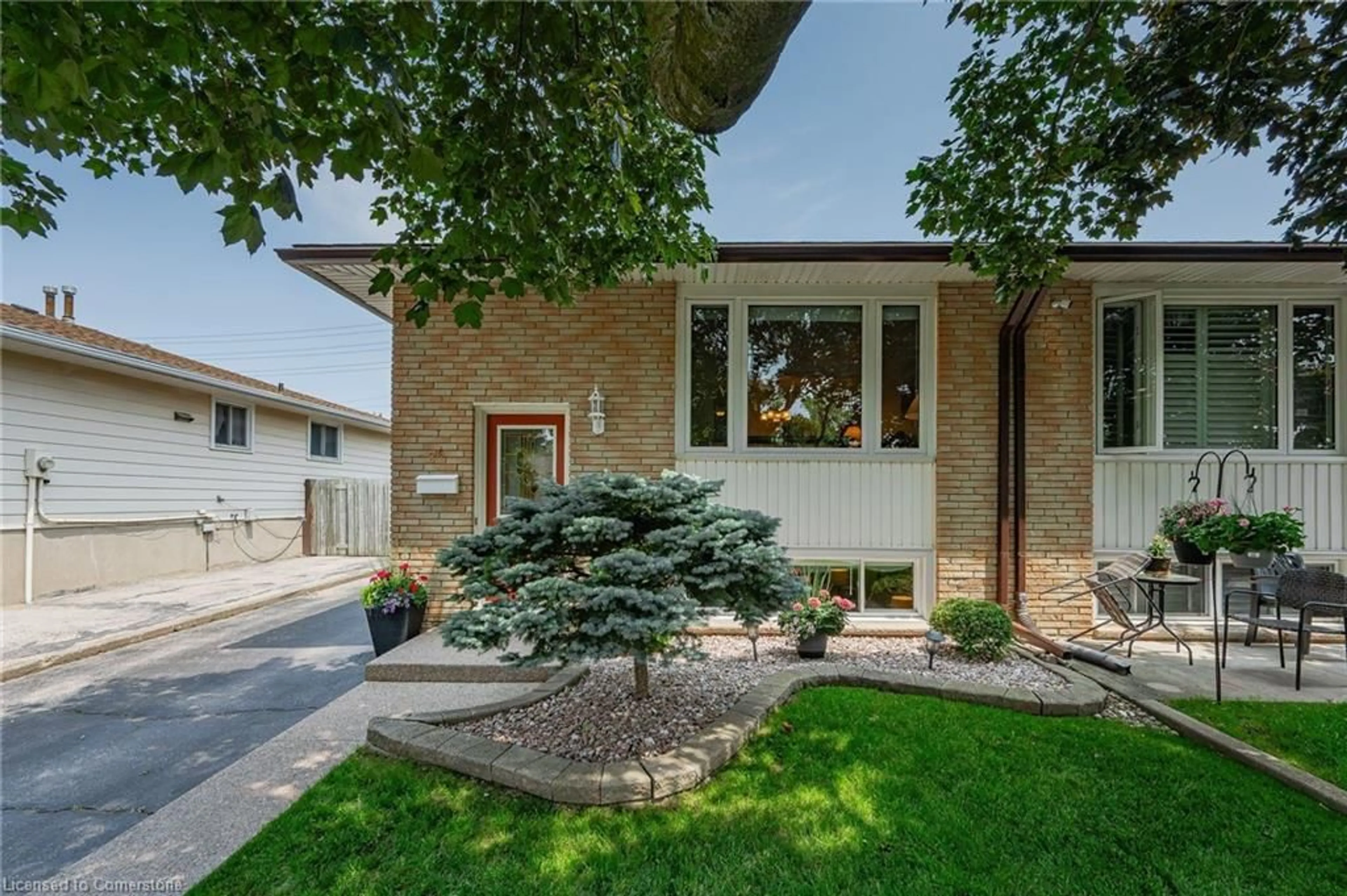 Home with brick exterior material, street for 84 Bakersfield Dr, Cambridge Ontario N1R 6X6