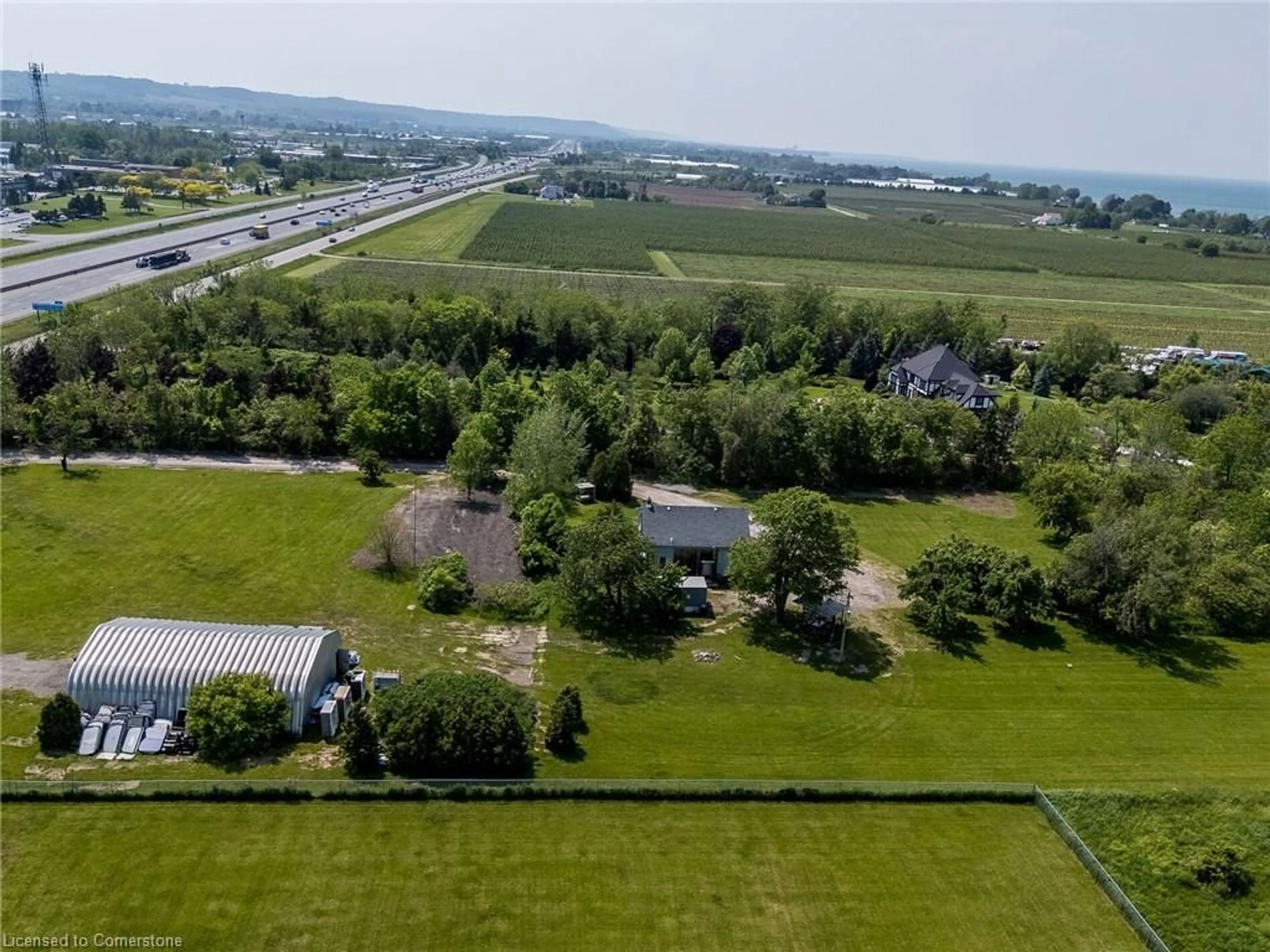 A pic from outside/outdoor area/front of a property/back of a property/a pic from drone, mountain view for 4613 North Service Rd, Beamsville Ontario L0R 1B1