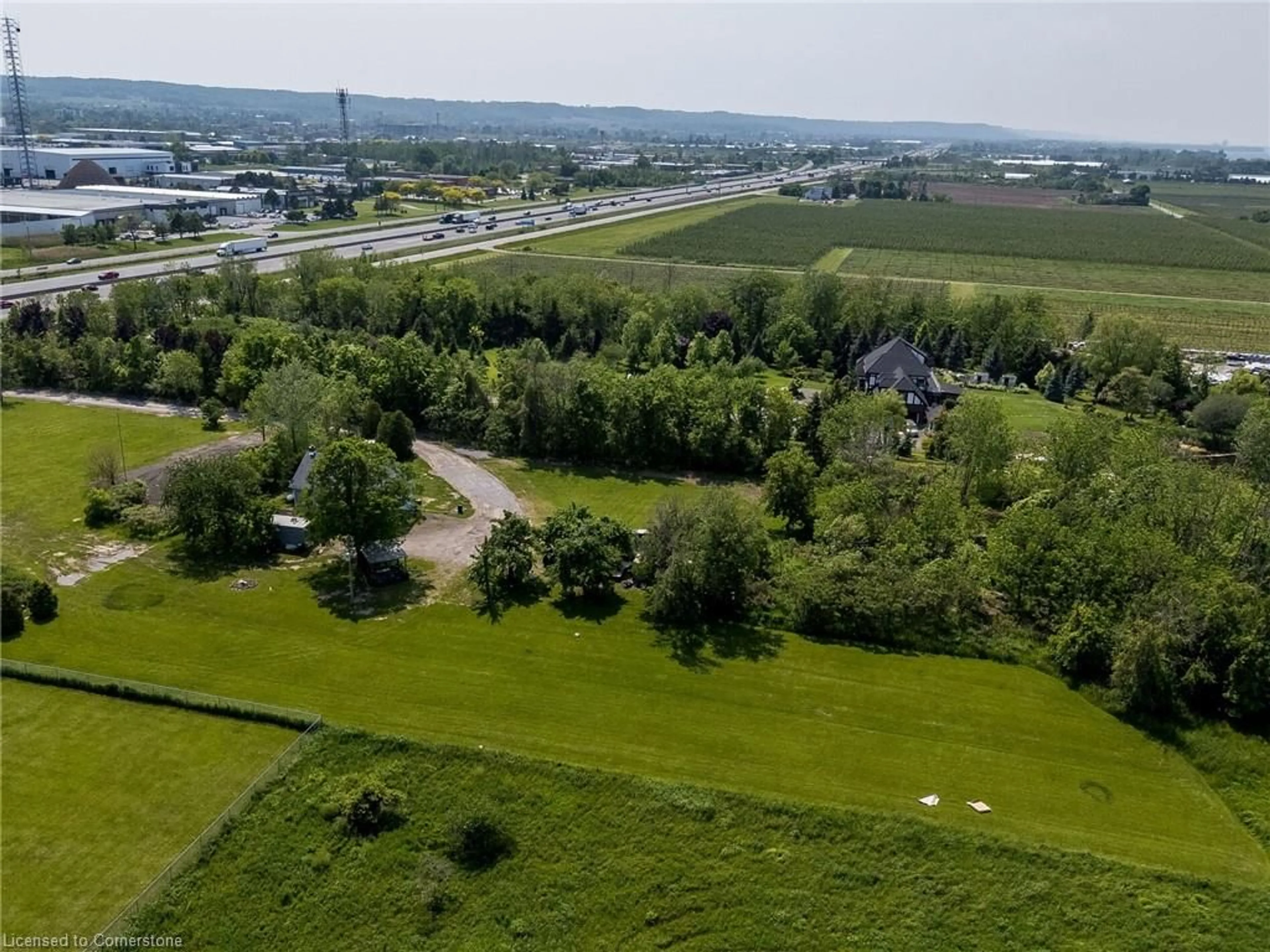 A pic from outside/outdoor area/front of a property/back of a property/a pic from drone, mountain view for 4613 North Service Rd, Beamsville Ontario L0R 1B1