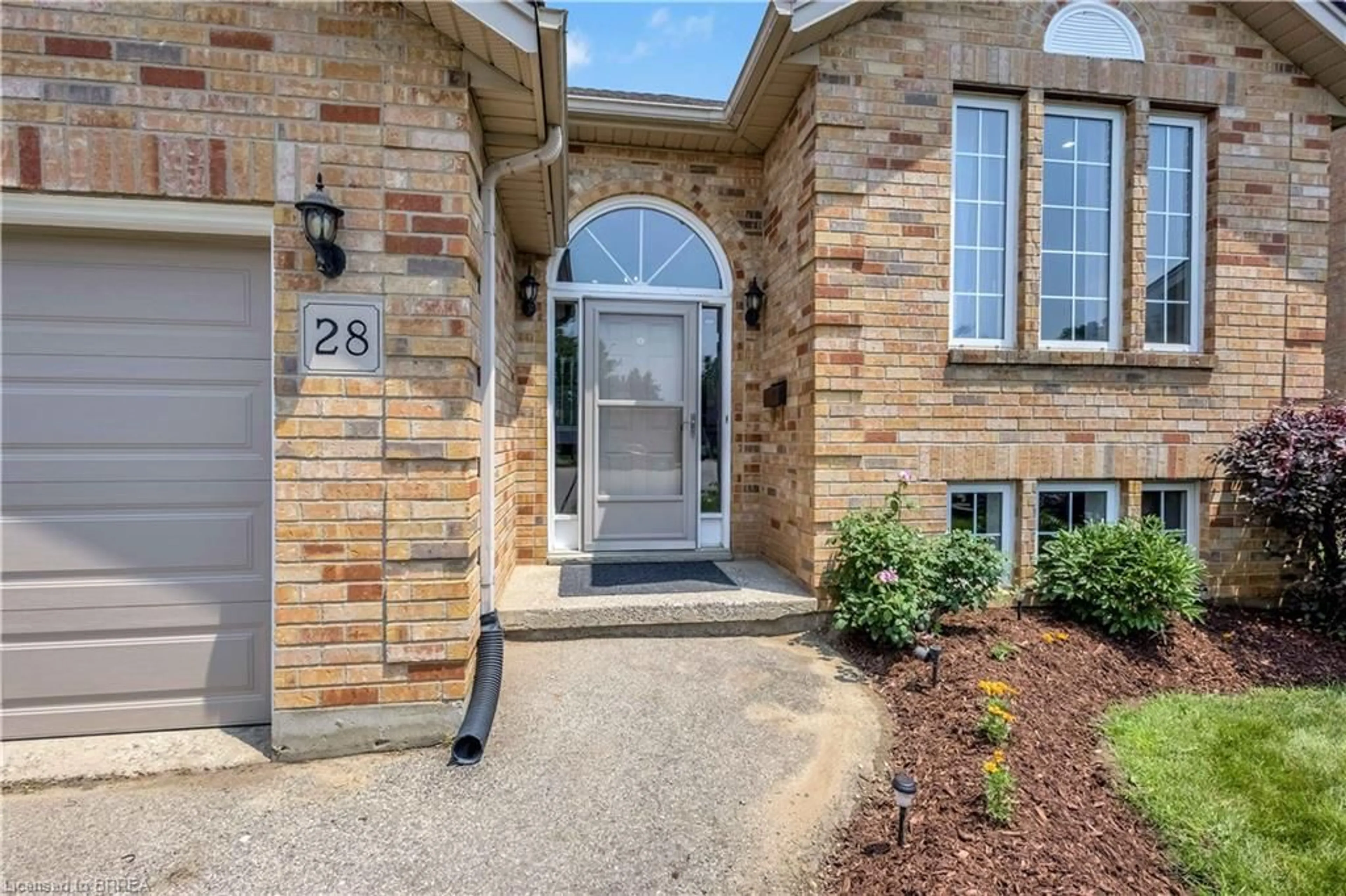 Home with brick exterior material, street for 28 Strong Crt, Brantford Ontario N3R 7Y4