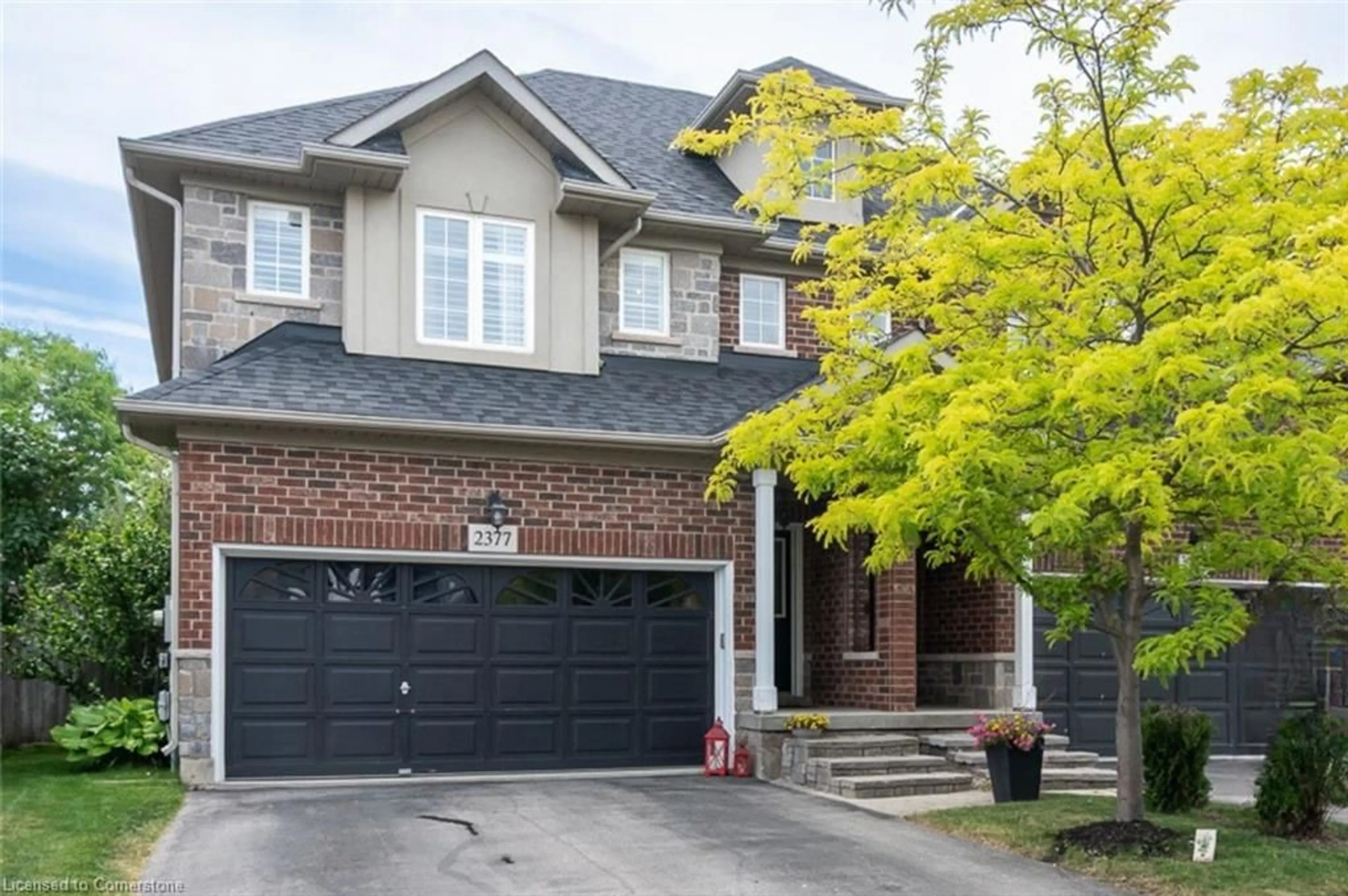 Home with brick exterior material, street for 2377 Stone Glen Cres, Oakville Ontario L6M 0C7
