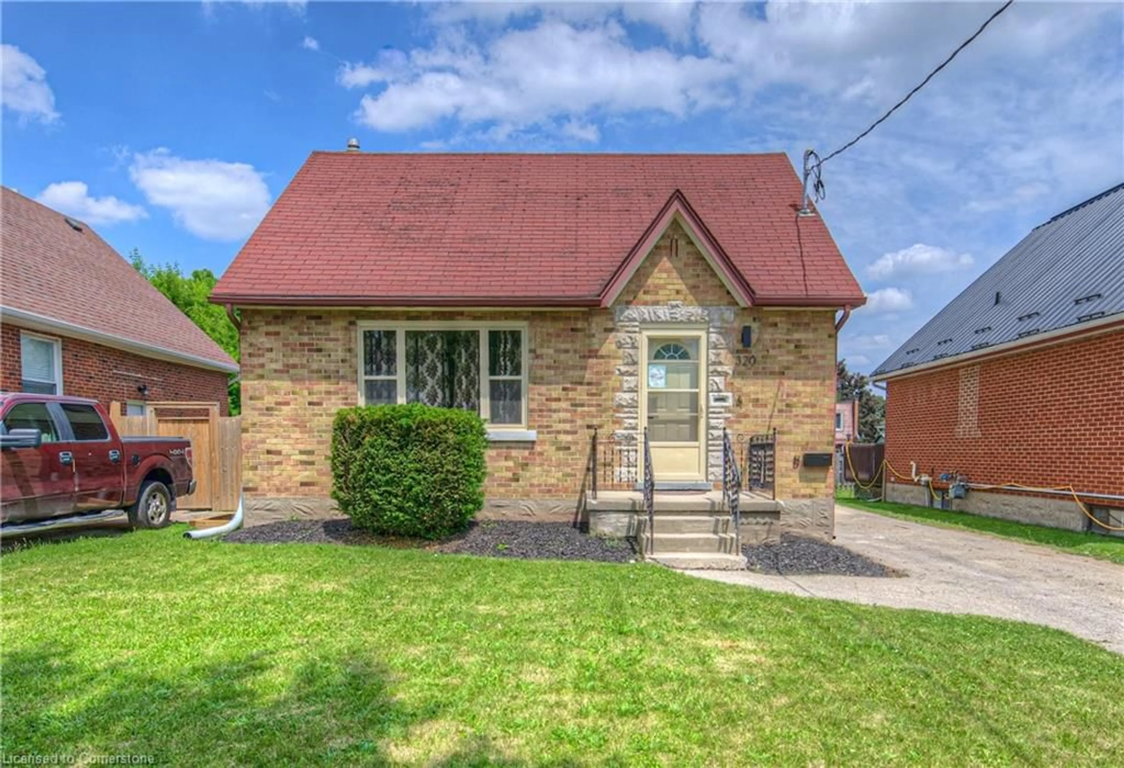 Home with brick exterior material, street for 320 Highland Rd, Kitchener Ontario N2M 3W4