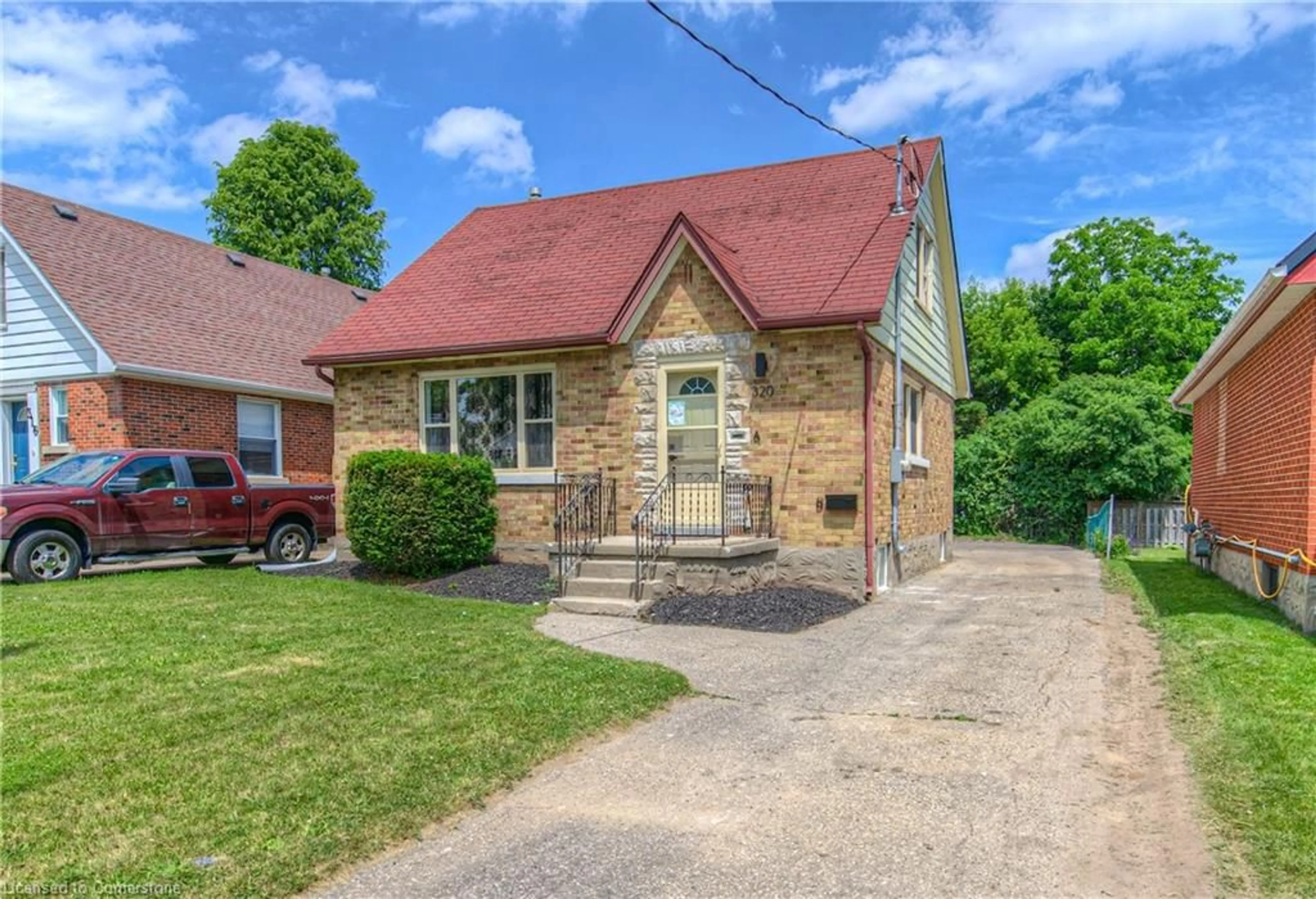 Home with brick exterior material, street for 320 Highland Rd, Kitchener Ontario N2M 3W4