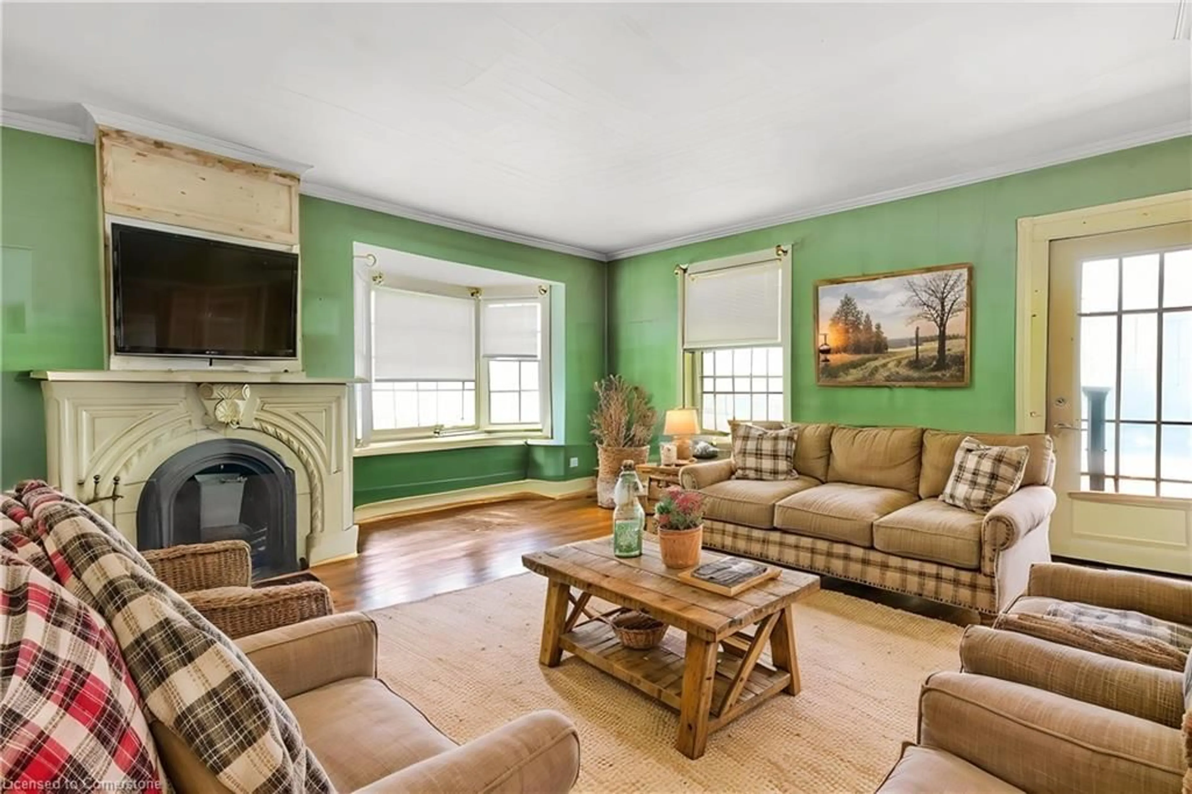 Living room with furniture, wood/laminate floor for 36 Elgin E/S St, Conestogo Ontario N3B 1Y3