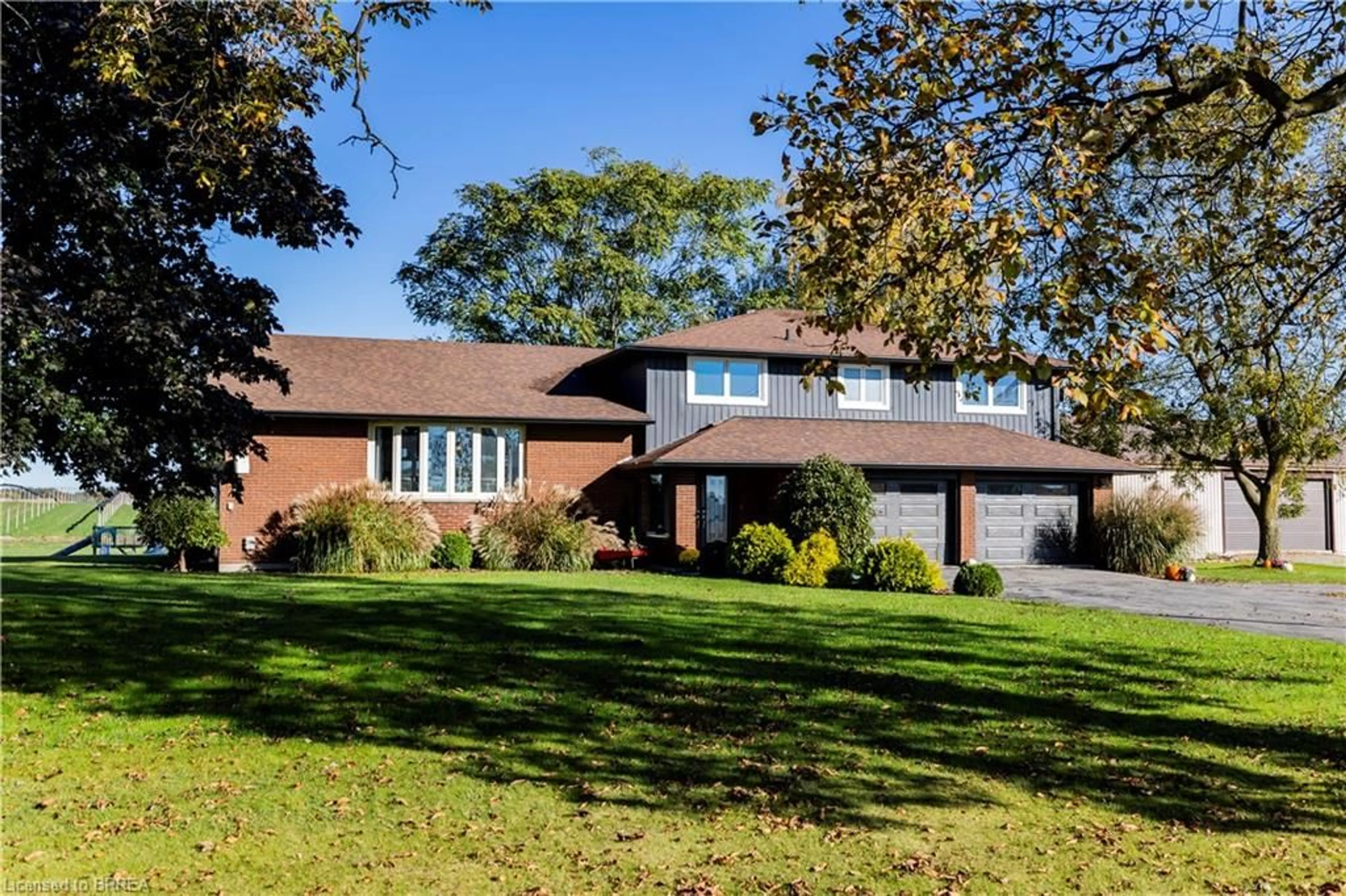 Home with brick exterior material, street for 1271 Windham Road 12, Simcoe Ontario N3Y 4K3