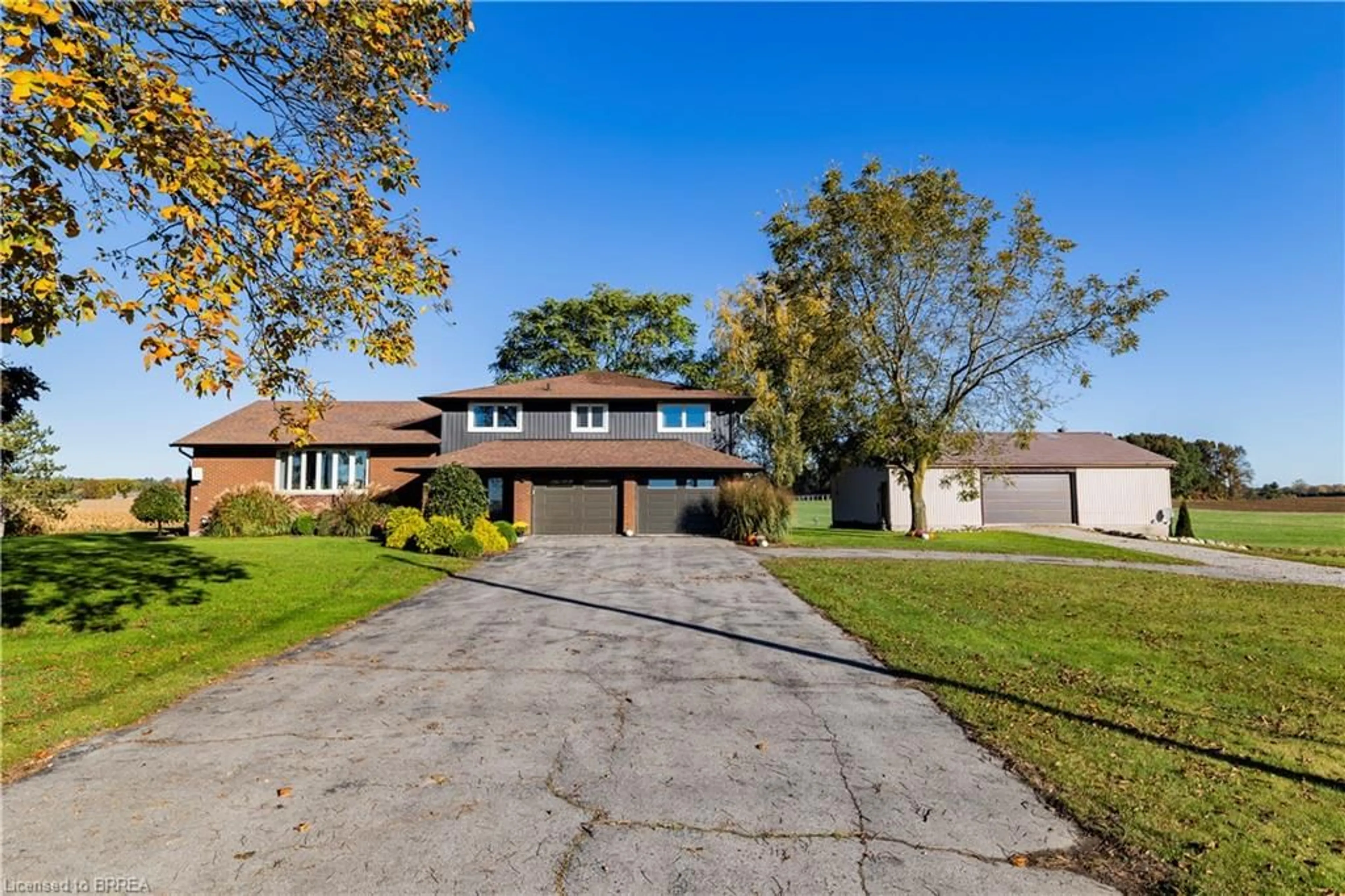 A pic from outside/outdoor area/front of a property/back of a property/a pic from drone, street for 1271 Windham Road 12, Simcoe Ontario N3Y 4K3