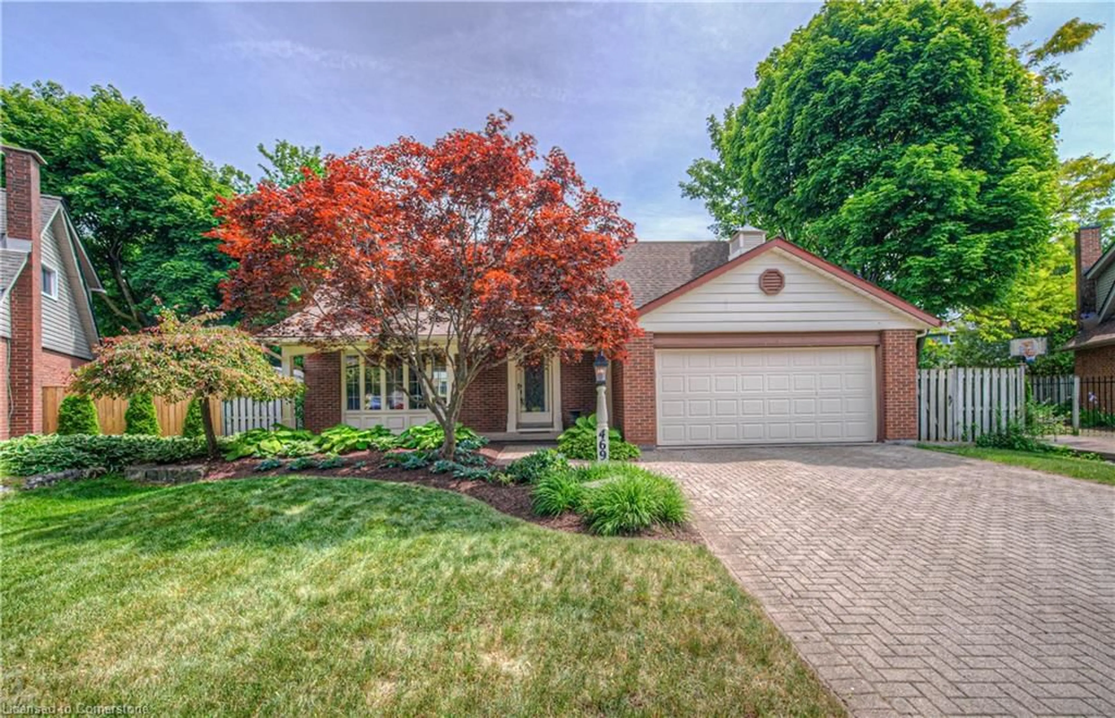 Home with brick exterior material, street for 469 Hunterswood Crt, Waterloo Ontario N2K 3E7