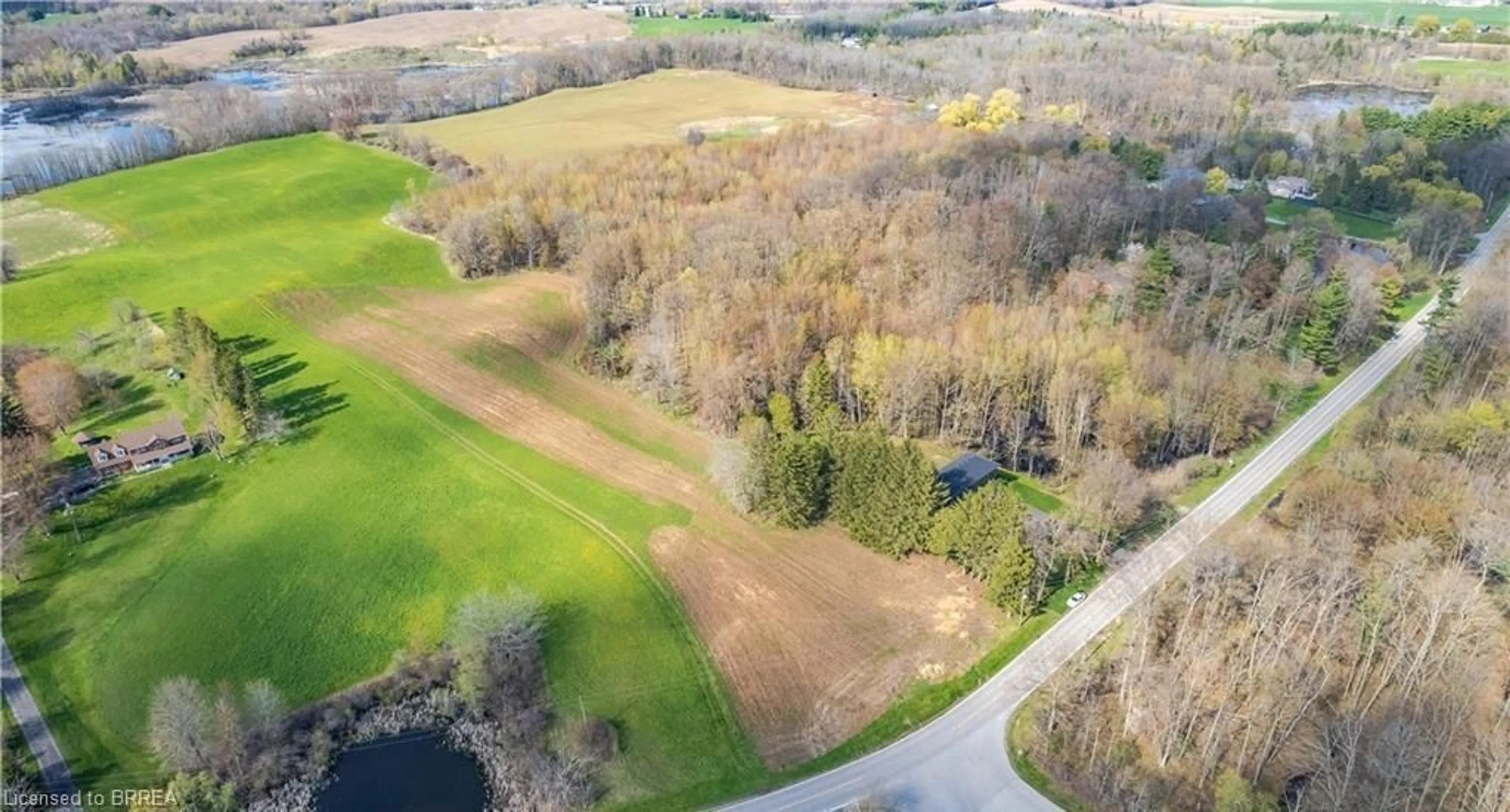 A pic from outside/outdoor area/front of a property/back of a property/a pic from drone, water/lake/river/ocean view for 371 Scenic Dr, St. George Ontario N0E 1N0