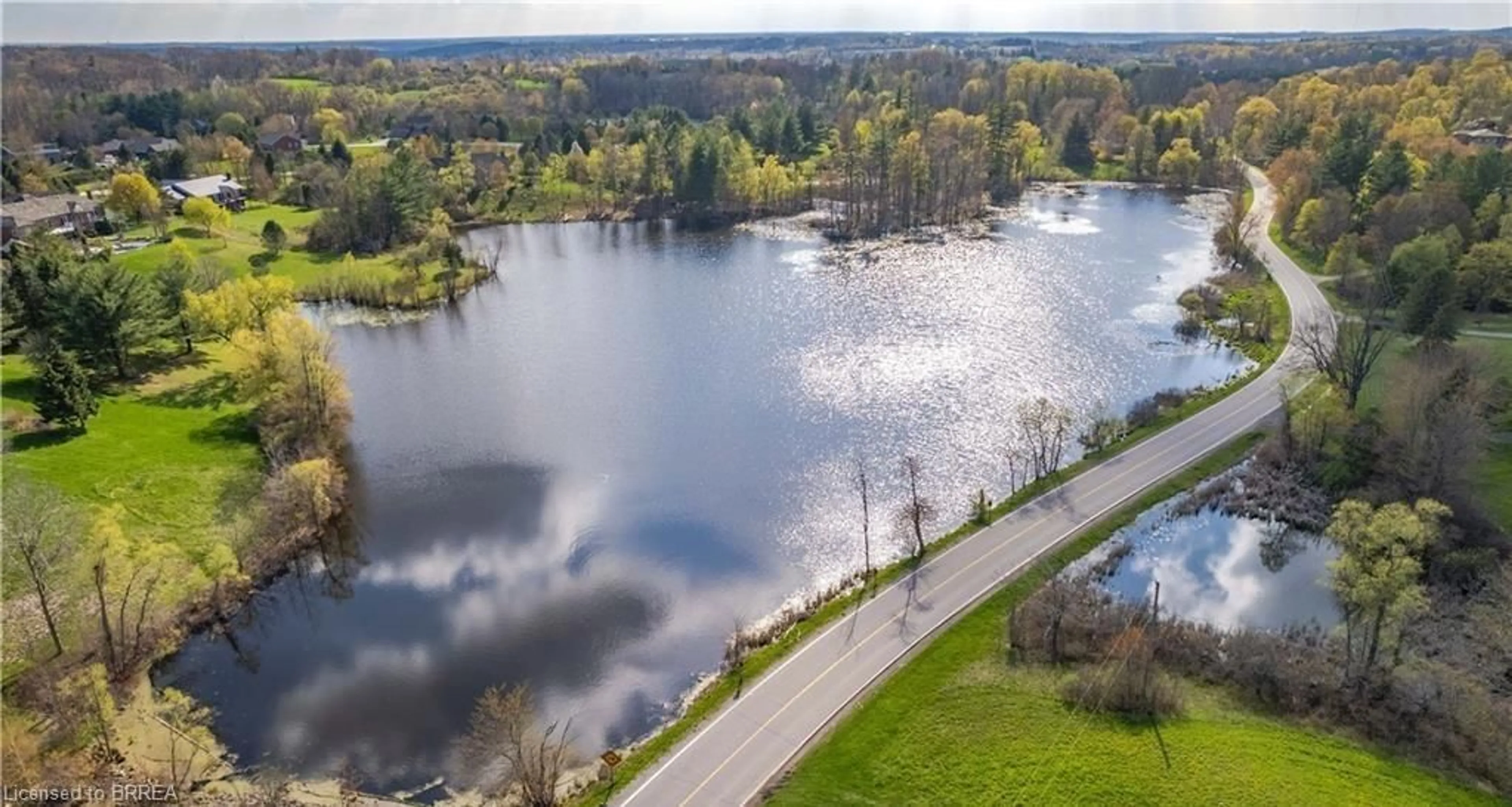A pic from outside/outdoor area/front of a property/back of a property/a pic from drone, water/lake/river/ocean view for 371 Scenic Dr, St. George Ontario N0E 1N0