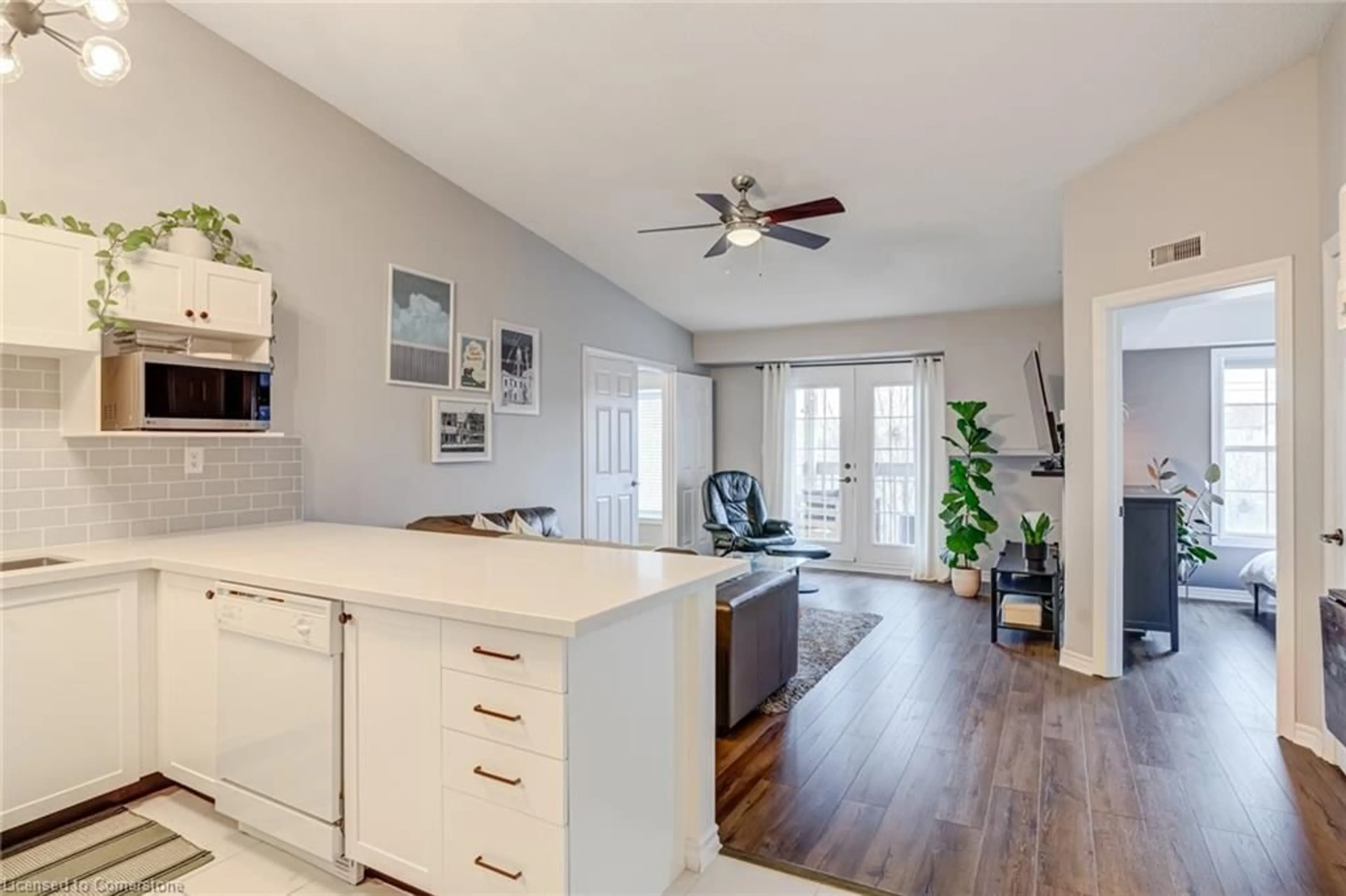 Open concept kitchen, wood/laminate floor for 4003 Kilmer Dr #403, Burlington Ontario L7M 4M1