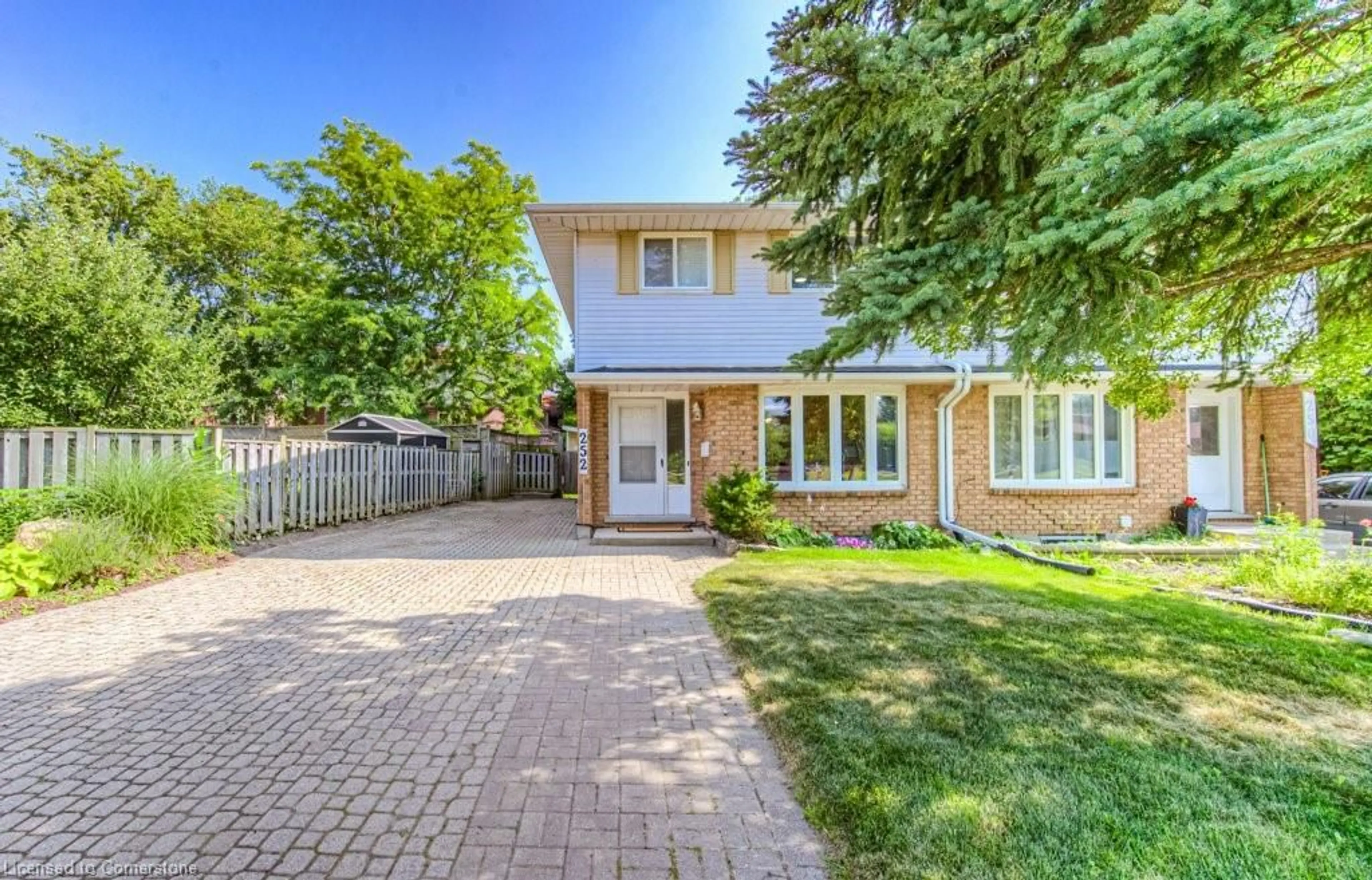 Home with brick exterior material, street for 252 Dinison Cres, Kitchener Ontario N2E 3G8