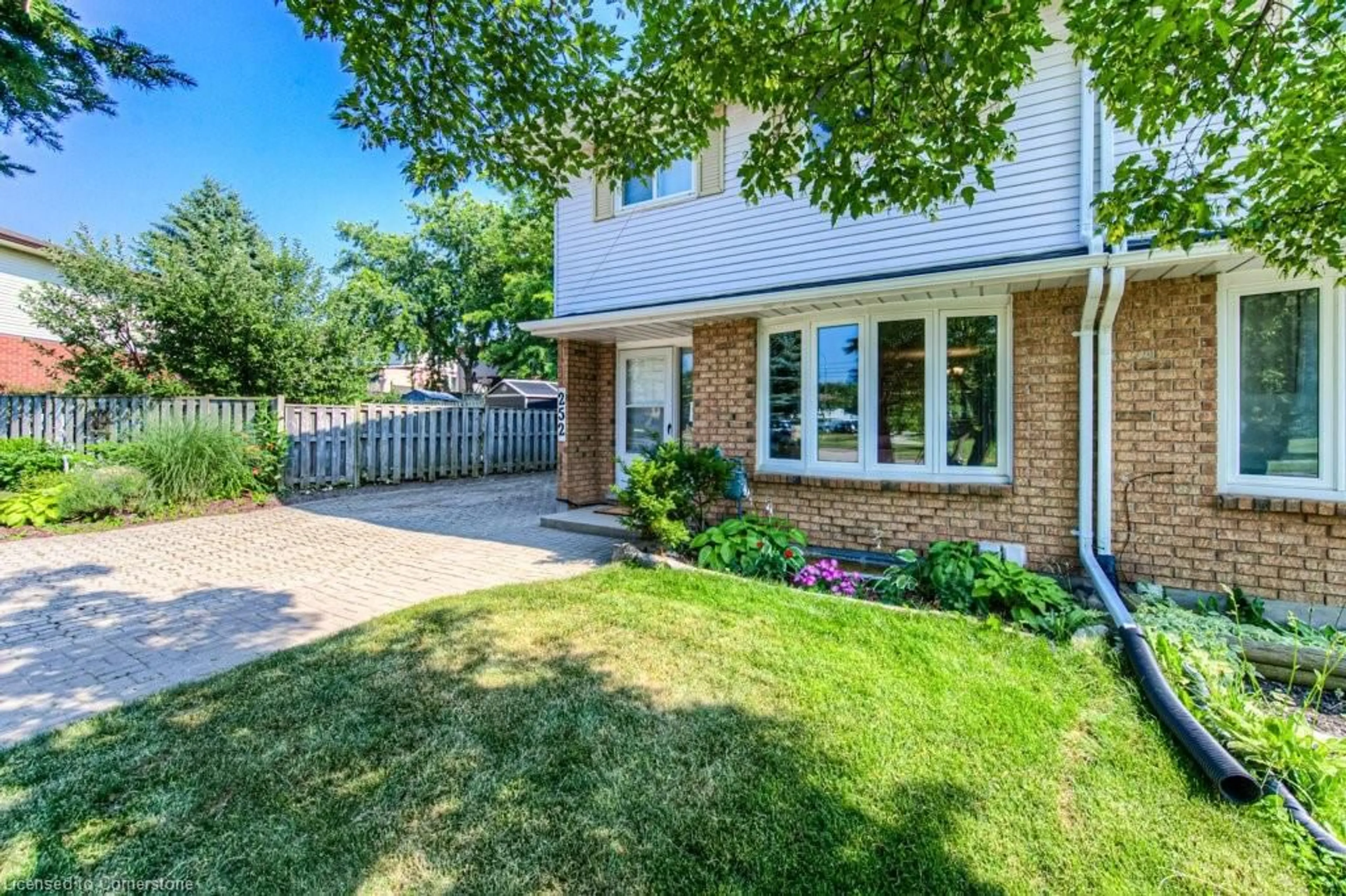 Home with brick exterior material, street for 252 Dinison Cres, Kitchener Ontario N2E 3G8