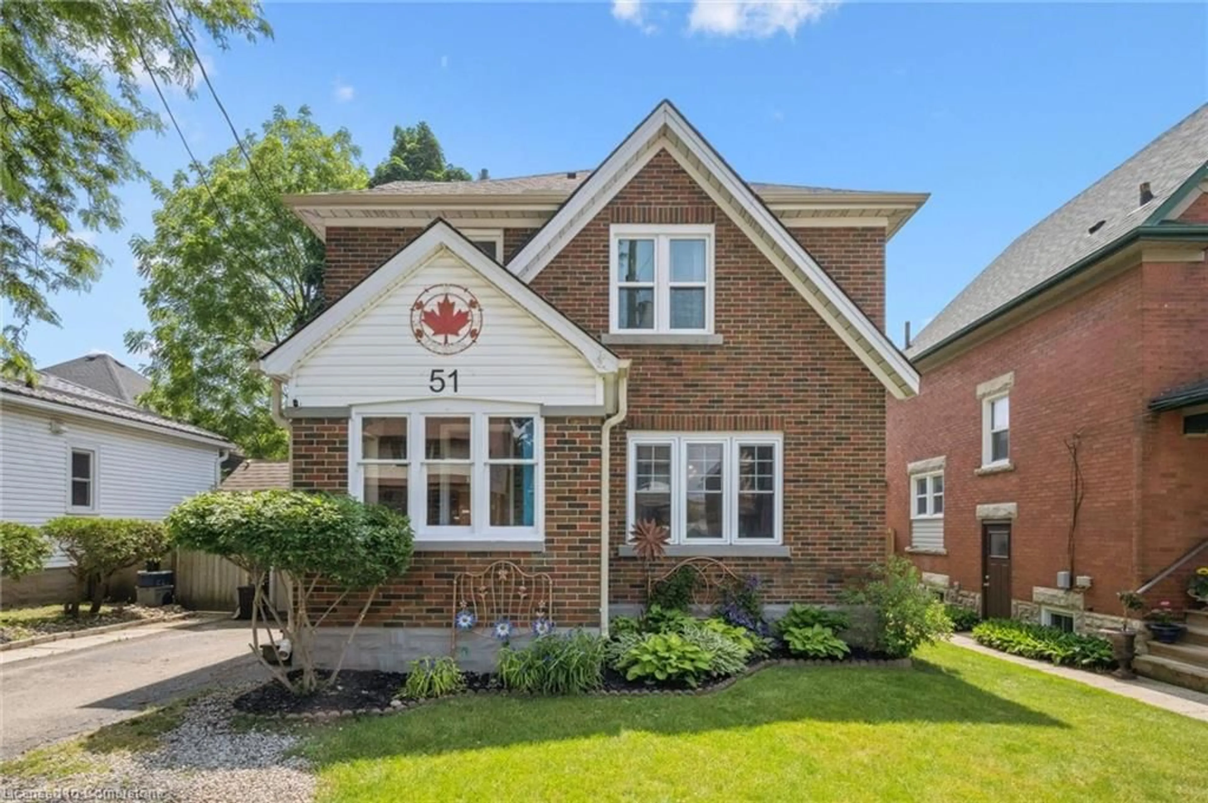 Home with brick exterior material, street for 51 Cherry St, Kitchener Ontario N2G 2C7