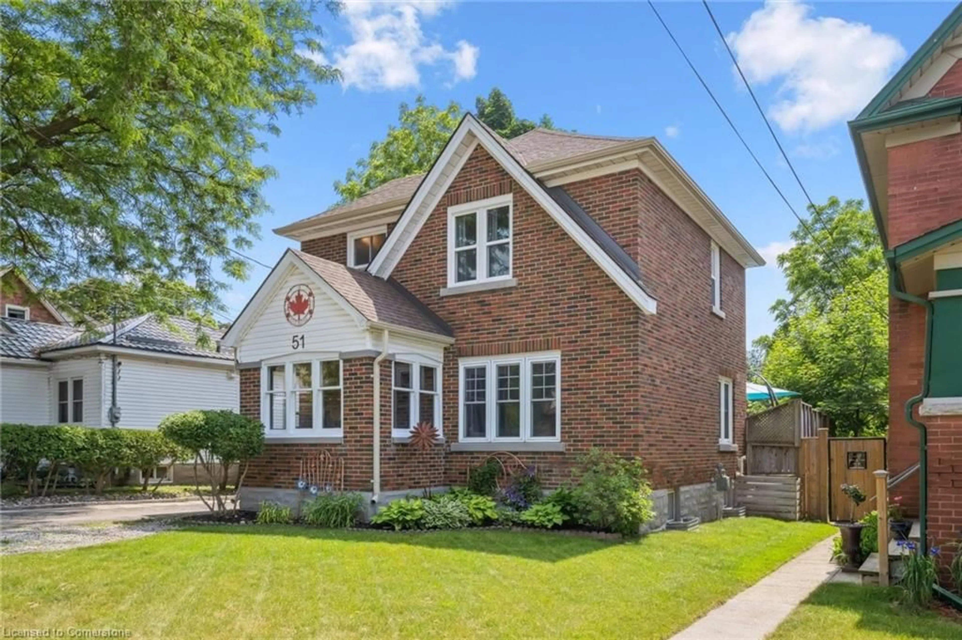 Home with brick exterior material, street for 51 Cherry St, Kitchener Ontario N2G 2C7