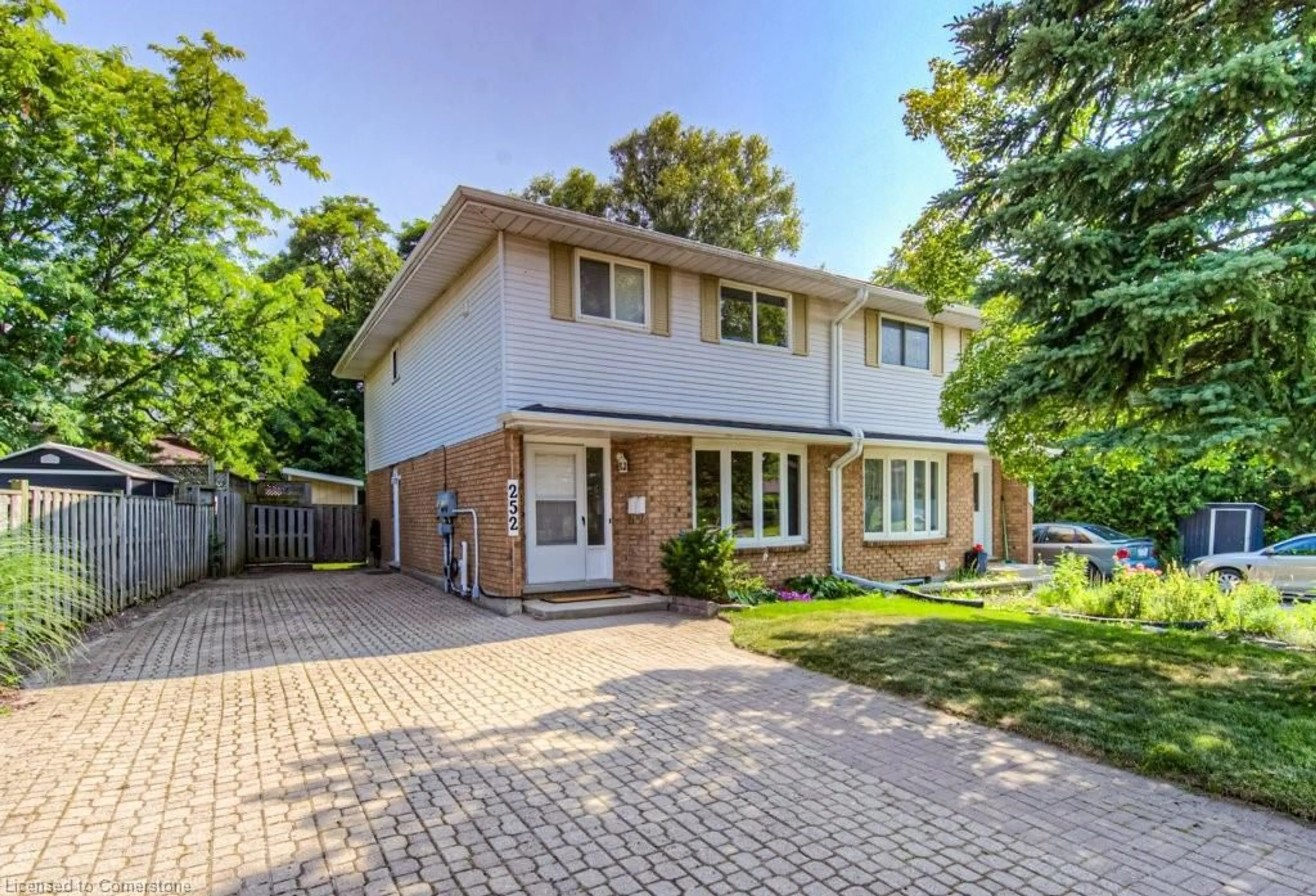 Home with brick exterior material, street for 252 Dinison Cres, Kitchener Ontario N2E 3G8