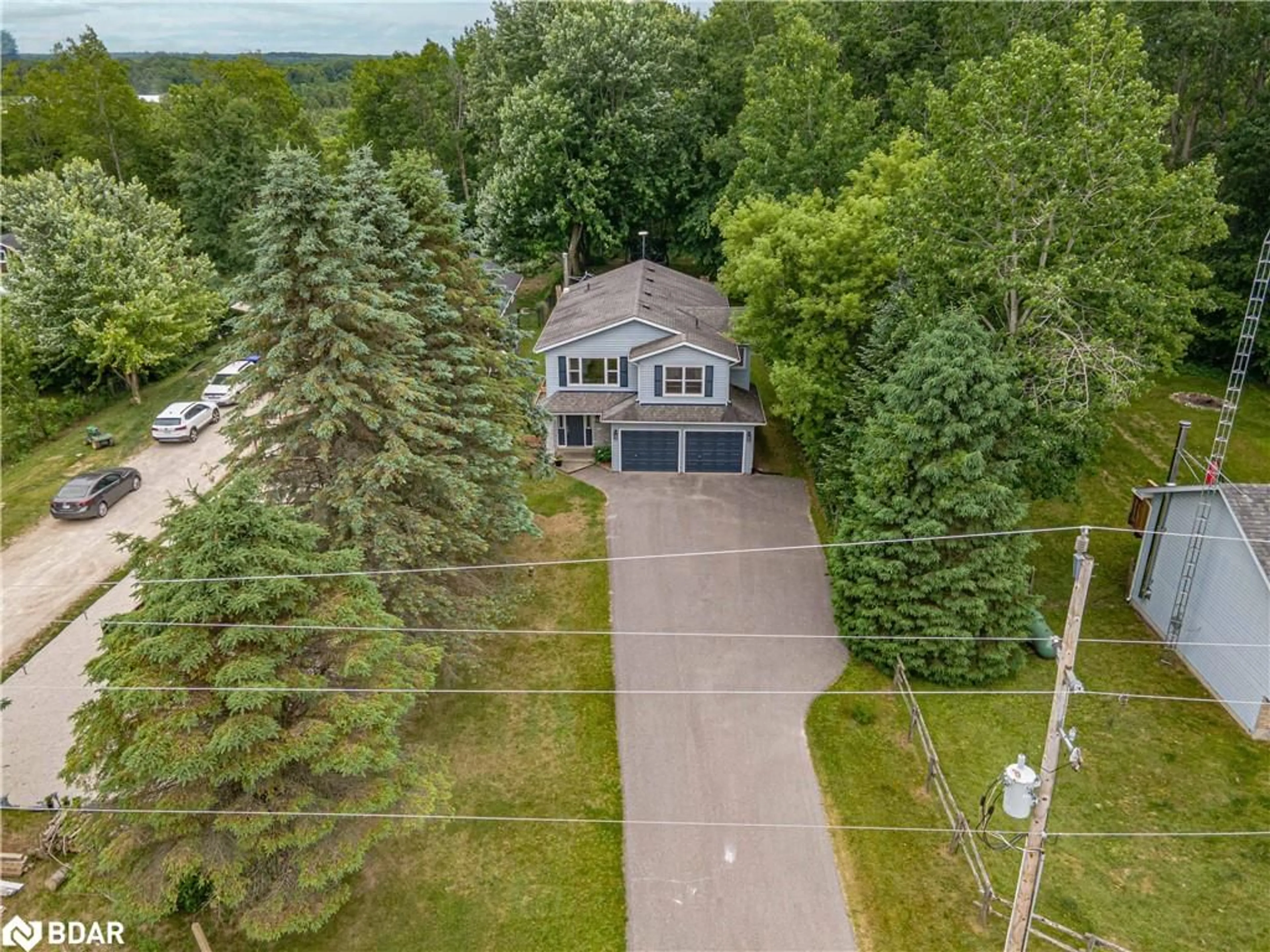 A pic from outside/outdoor area/front of a property/back of a property/a pic from drone, street for 9029 Webster Rd, Glencairn Ontario L0M 1K0