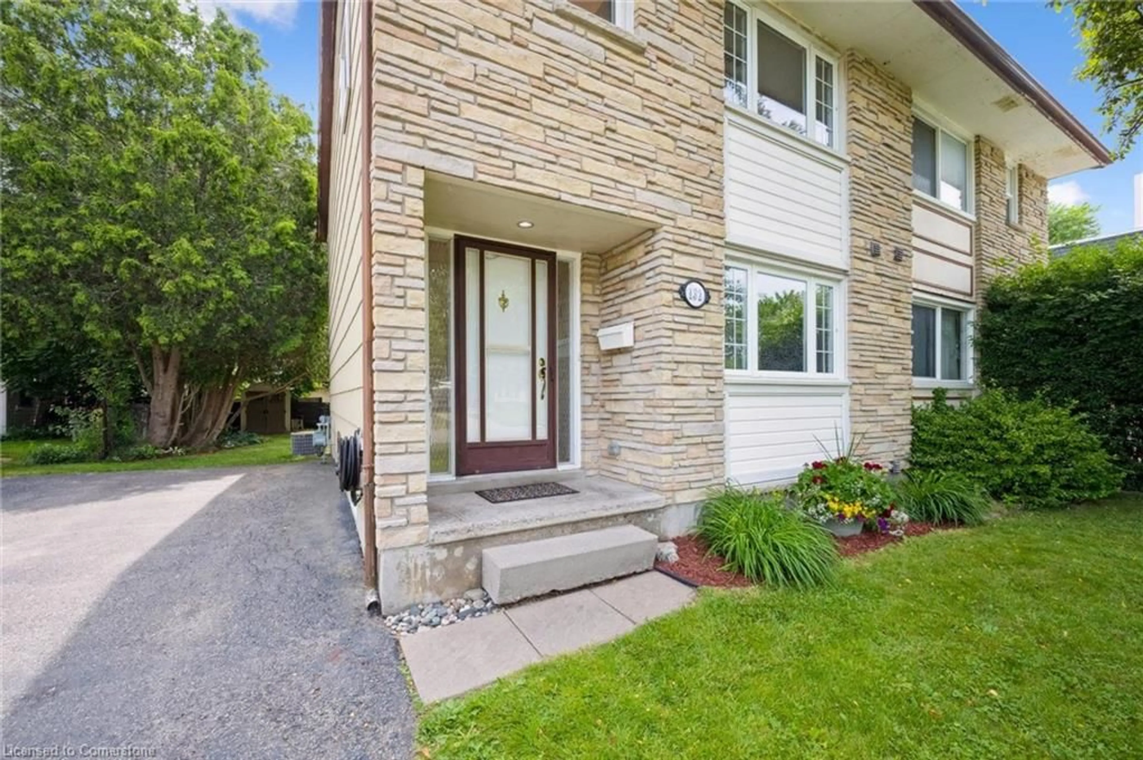 Home with brick exterior material, street for 132 Greendale Cres, Kitchener Ontario N2A 2R6