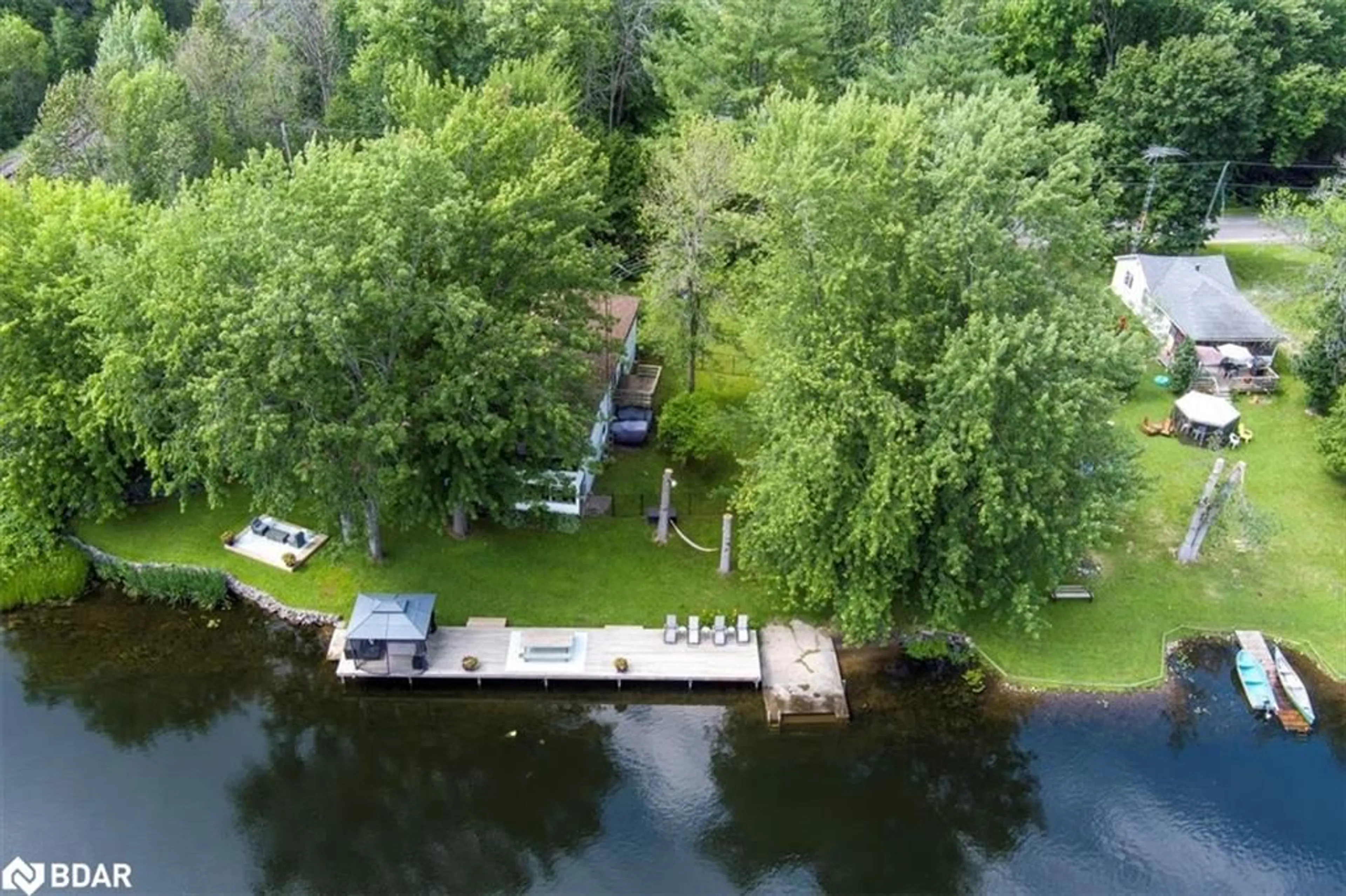 A pic from outside/outdoor area/front of a property/back of a property/a pic from drone, water/lake/river/ocean view for 1057 Severn River Rd, Gravenhurst Ontario P0E 1N0