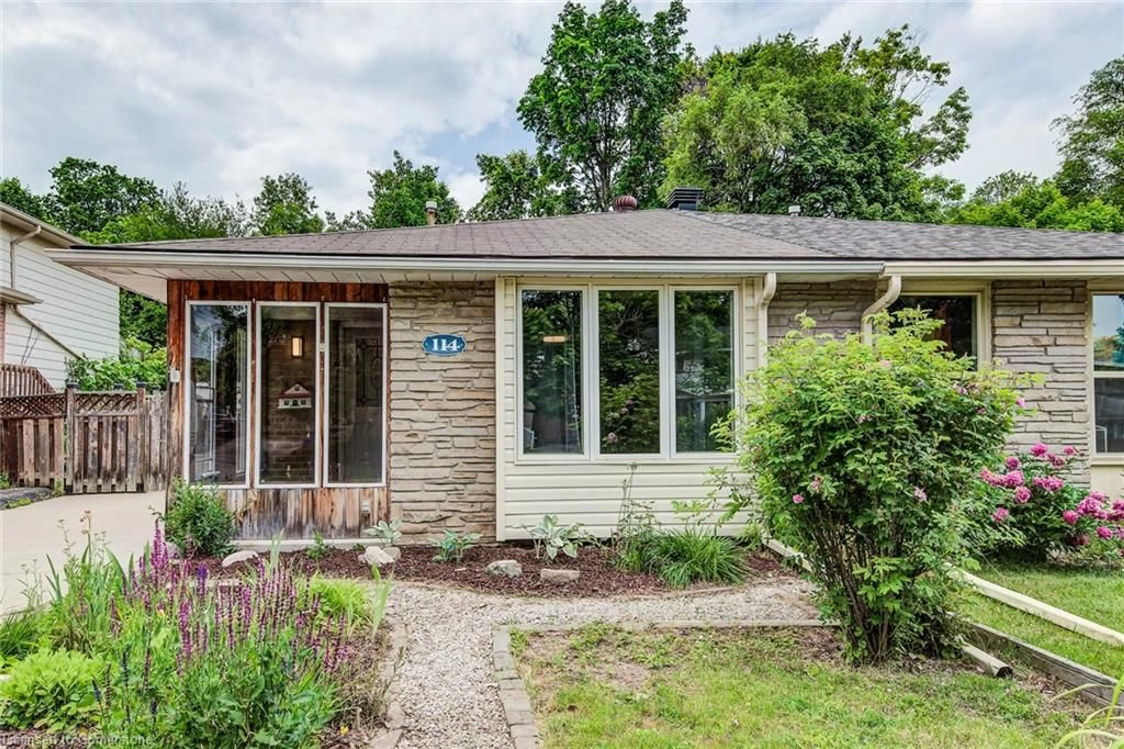 Home with brick exterior material, street for 114 Markwood Dr, Kitchener Ontario N2M 2H6