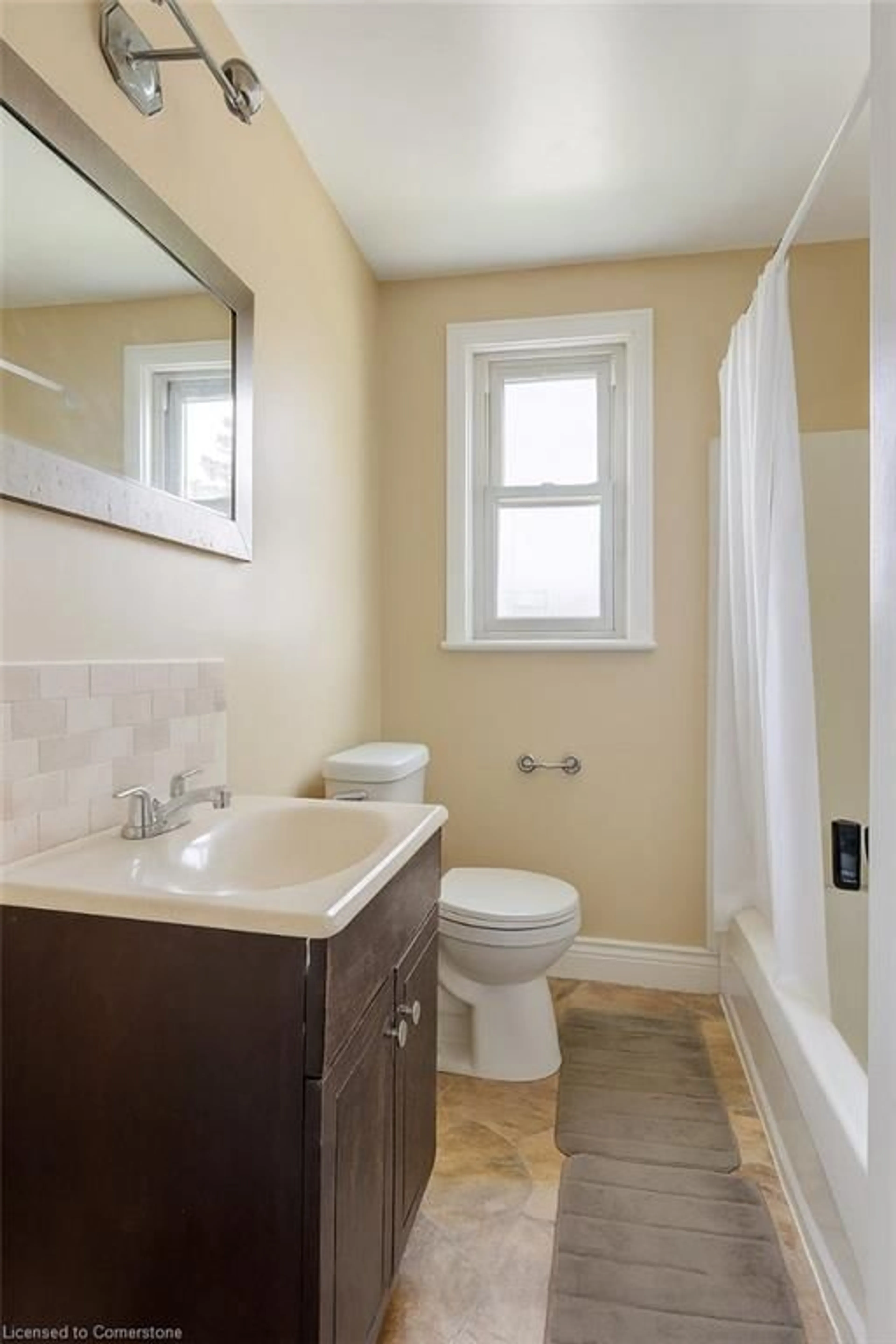 Standard bathroom, ceramic/tile floor for 17 West 3rd St, Hamilton Ontario L9C 3J5