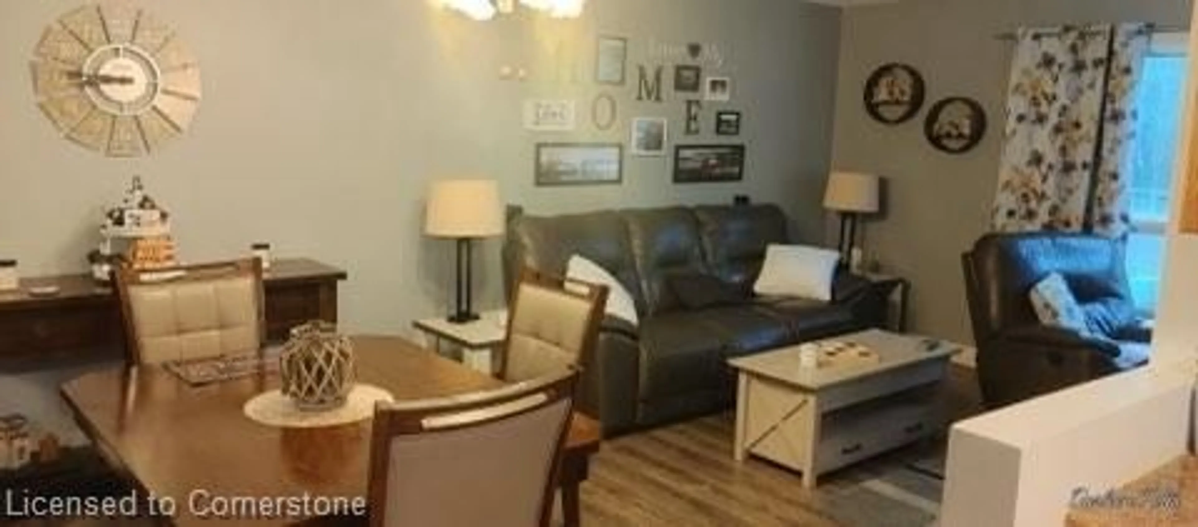 Living room with furniture, wood/laminate floor for 37 Briar Knoll Dr, Kitchener Ontario N2E 1X9