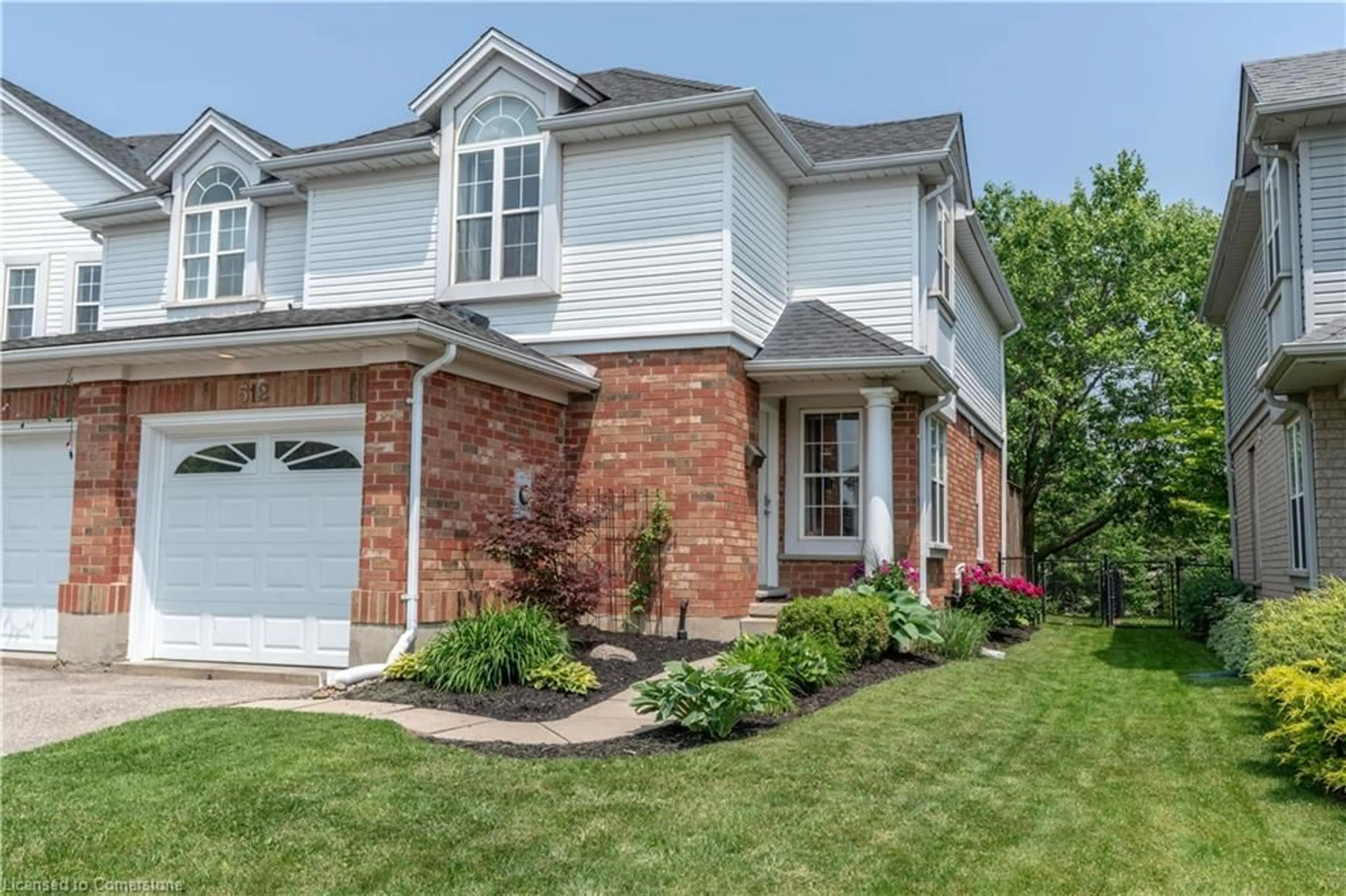 Home with brick exterior material, street for 512 Mayflower St, Waterloo Ontario N2K 3Y7