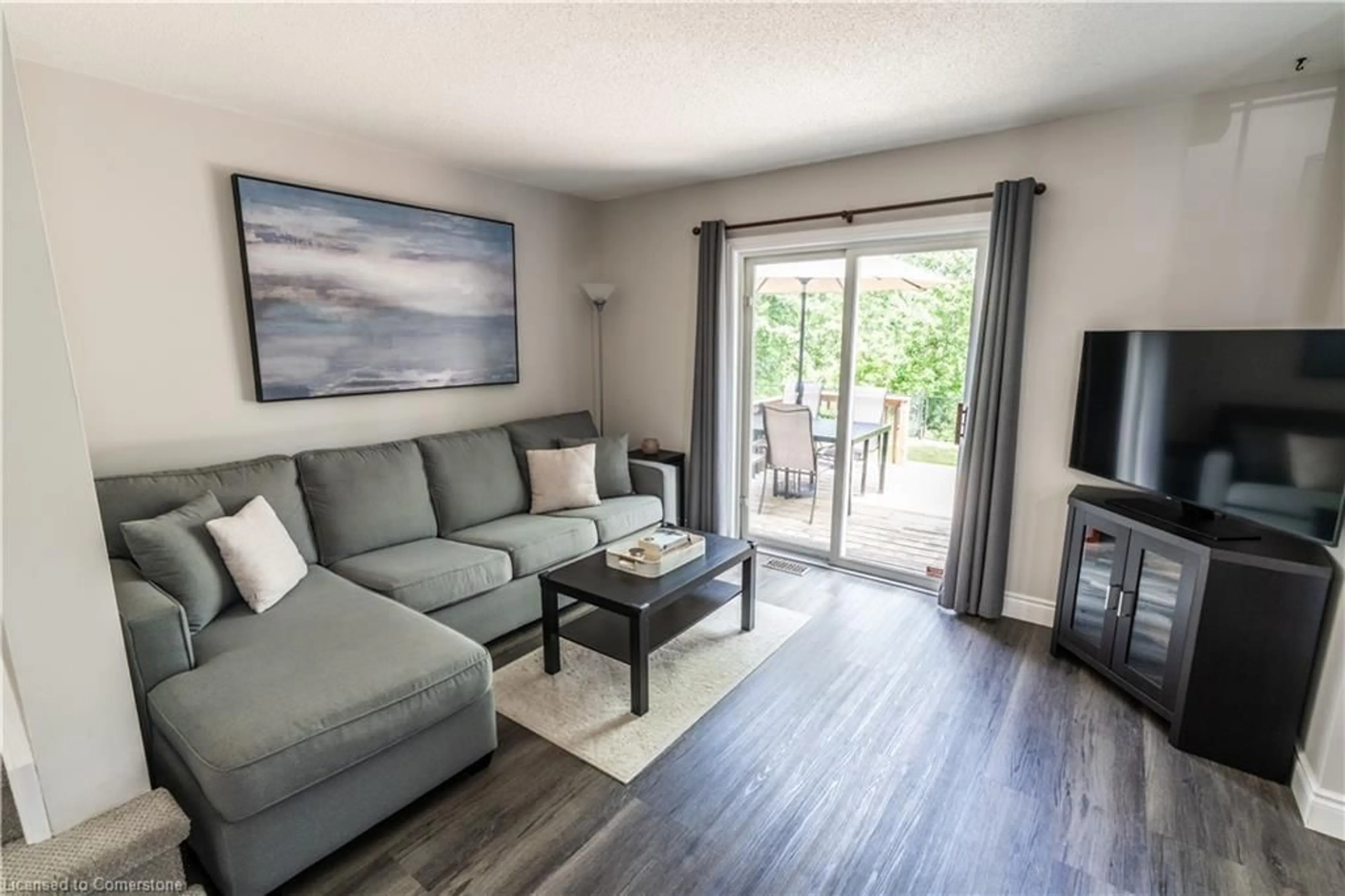 Living room with furniture, wood/laminate floor for 512 Mayflower St, Waterloo Ontario N2K 3Y7