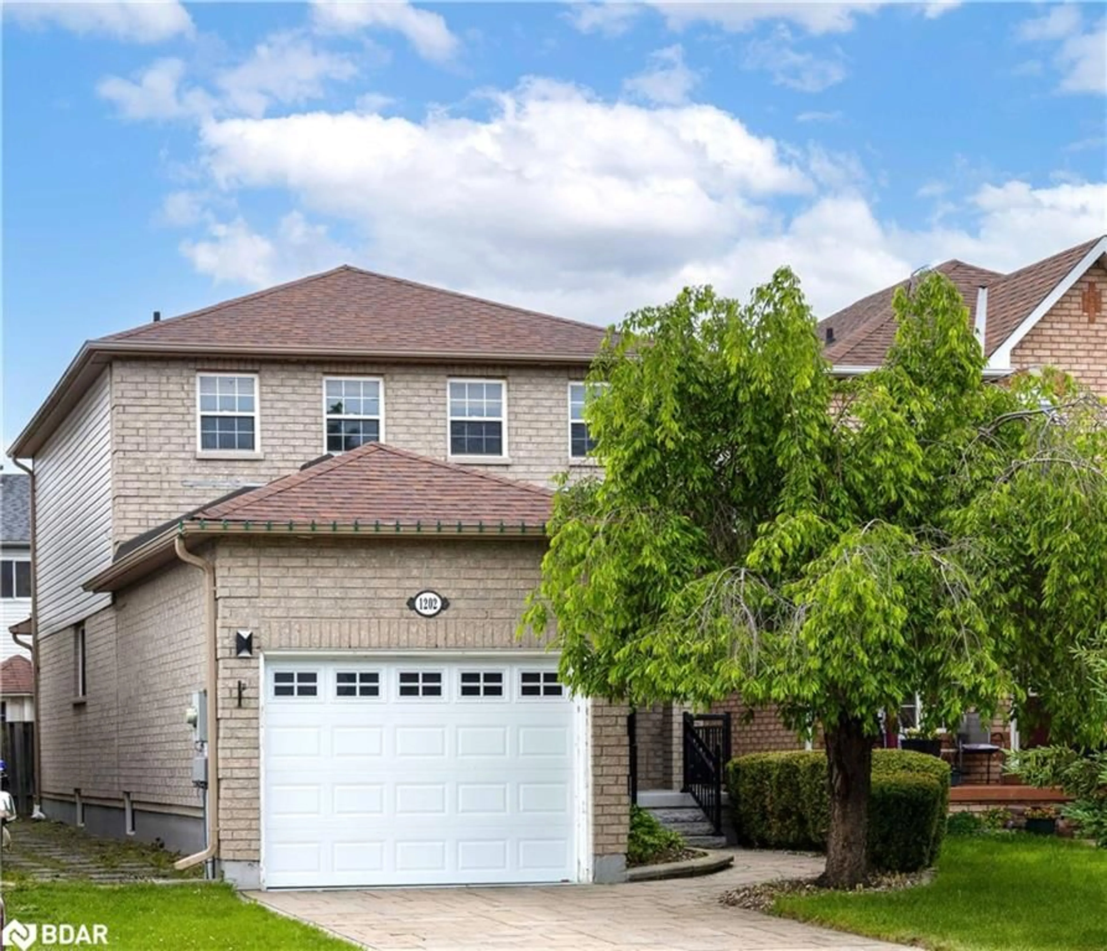 Home with brick exterior material, street for 1202 Andrade Lane, Innisfil Ontario L9S 4X6