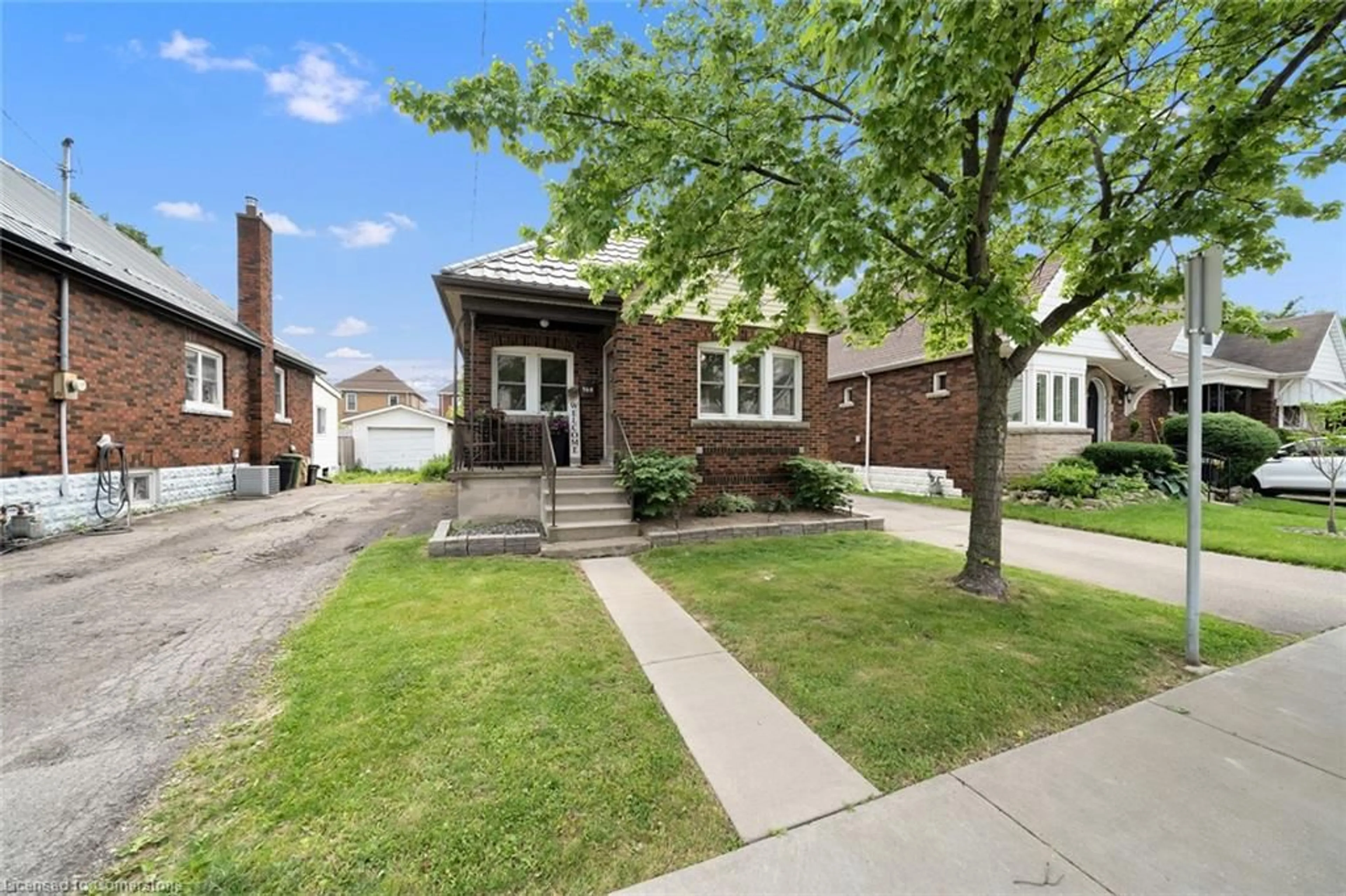Home with brick exterior material, street for 168 Cope St, Hamilton Ontario L8H 5B4