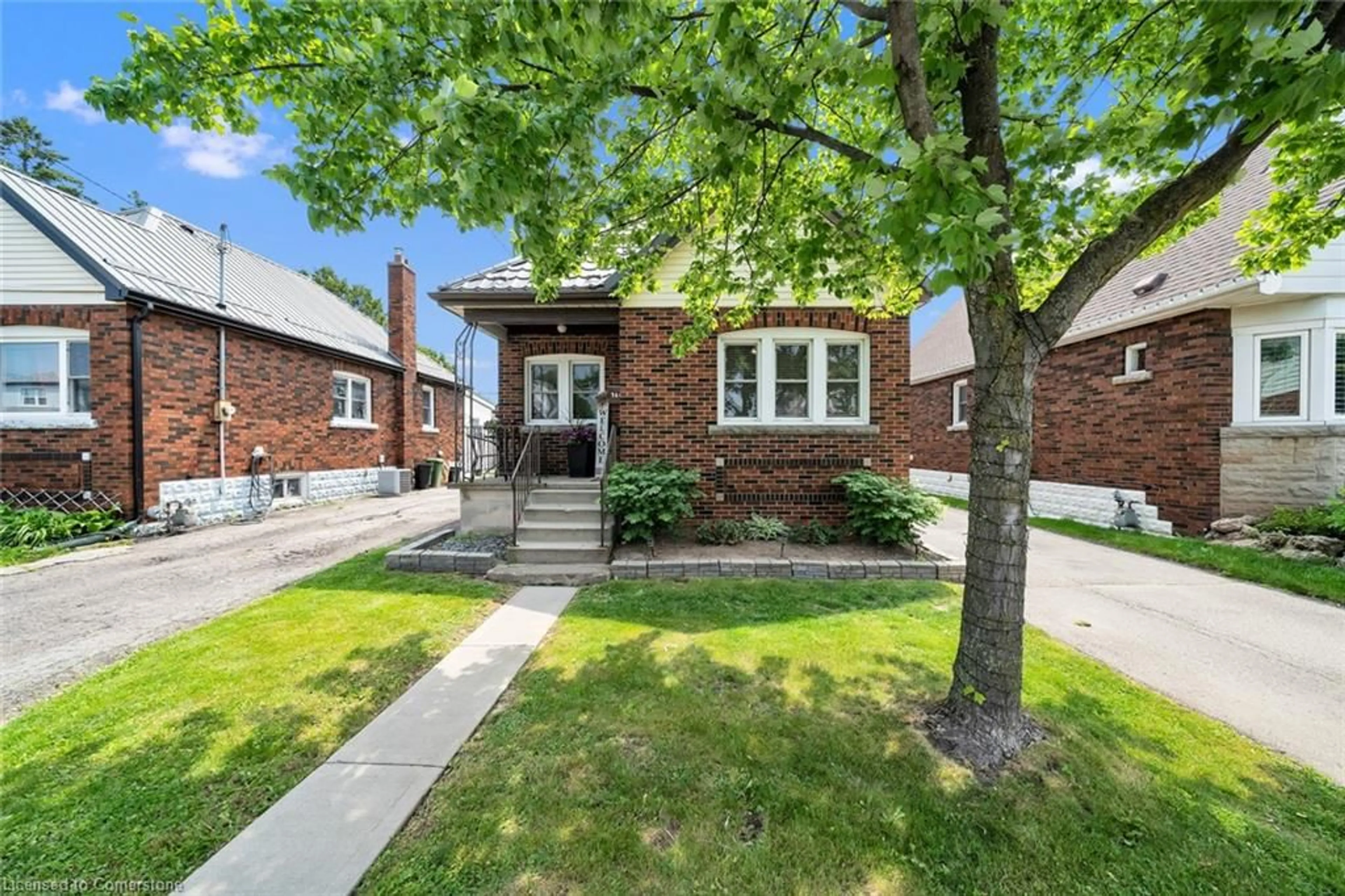 Home with brick exterior material, street for 168 Cope St, Hamilton Ontario L8H 5B4
