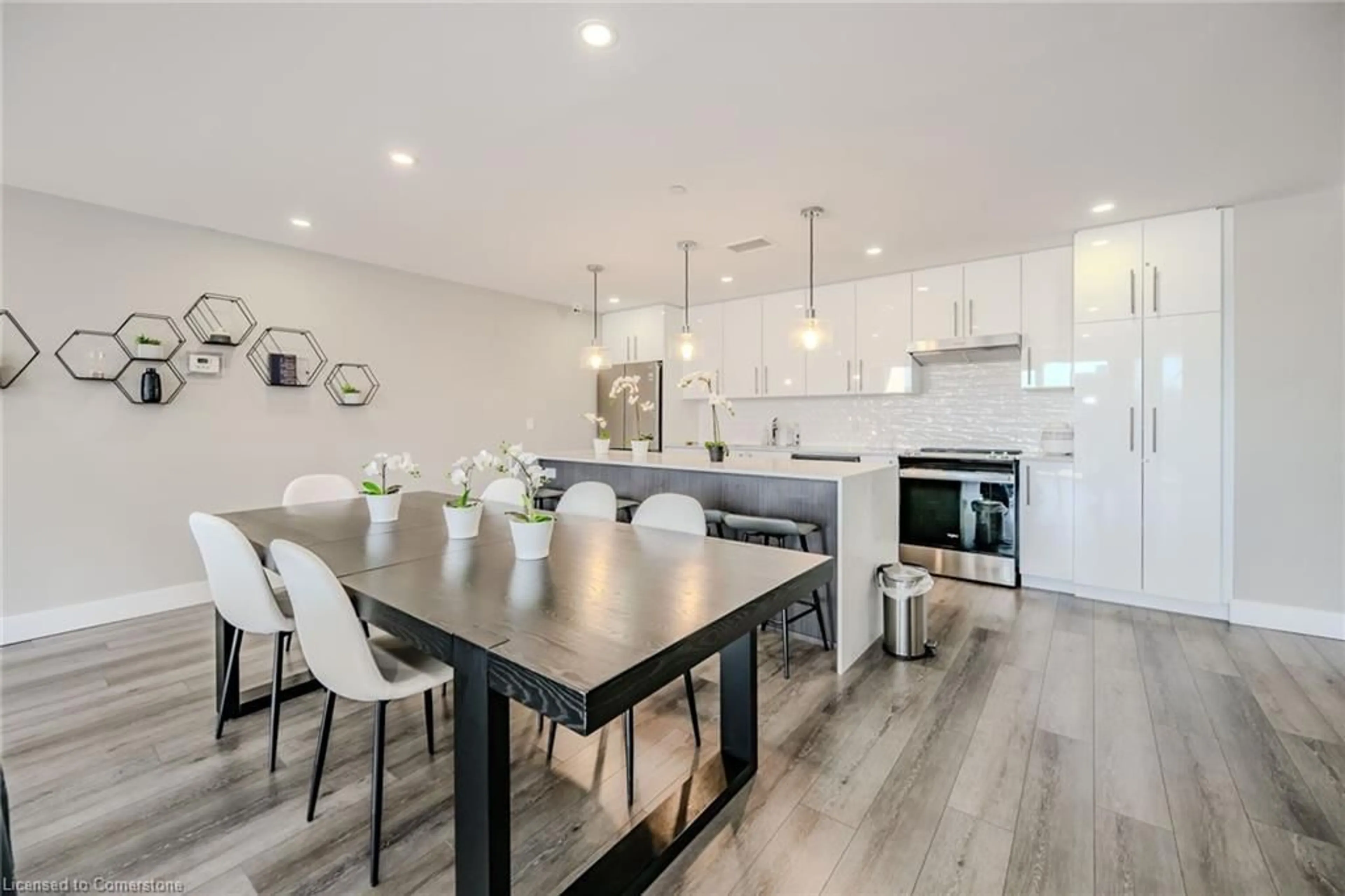 Open concept kitchen, wood/laminate floor for 15 Queen St #601, Hamilton Ontario L8P 0C6