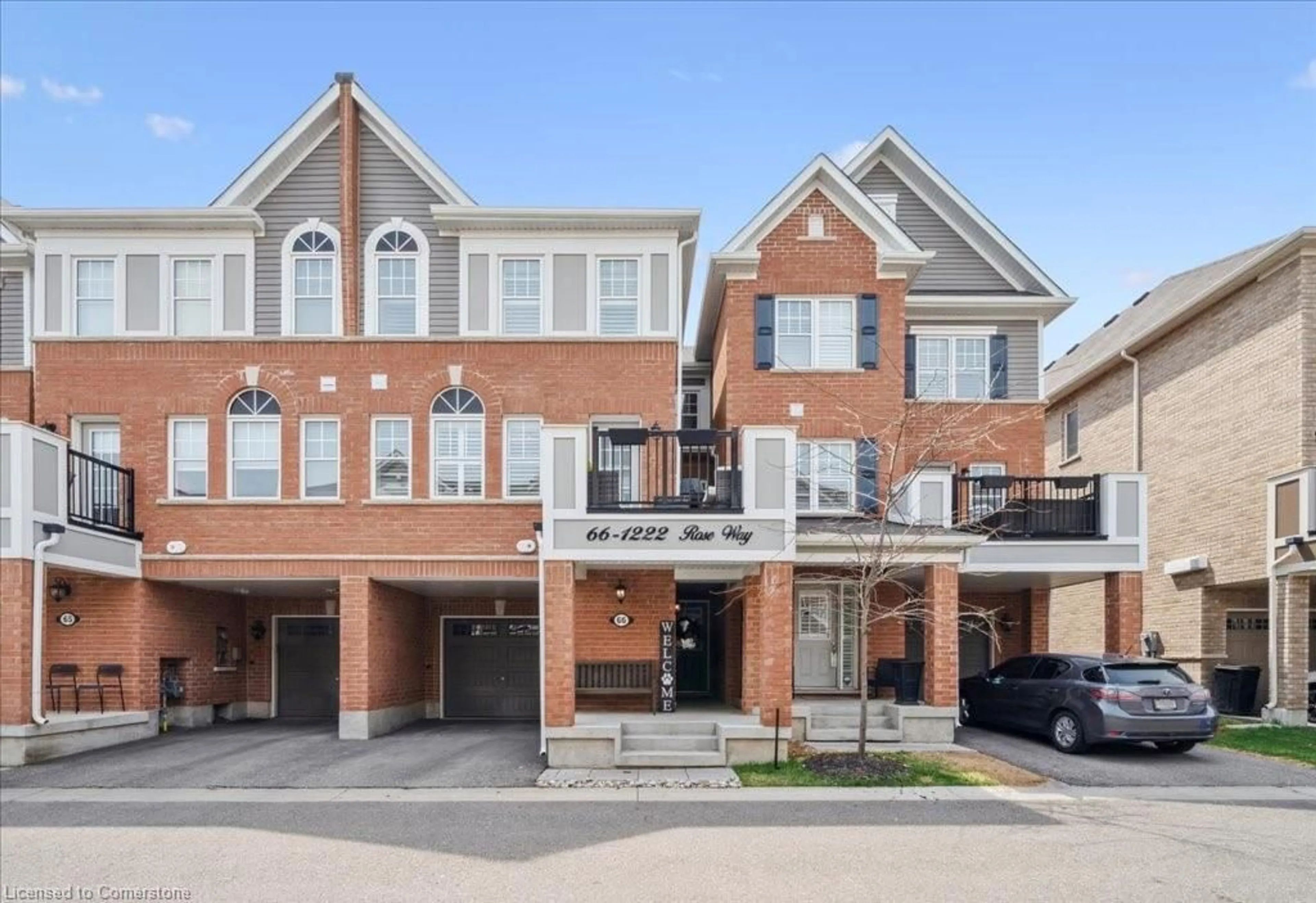 Home with brick exterior material, street for 1222 Rose Way, Milton Ontario L9E 1P2
