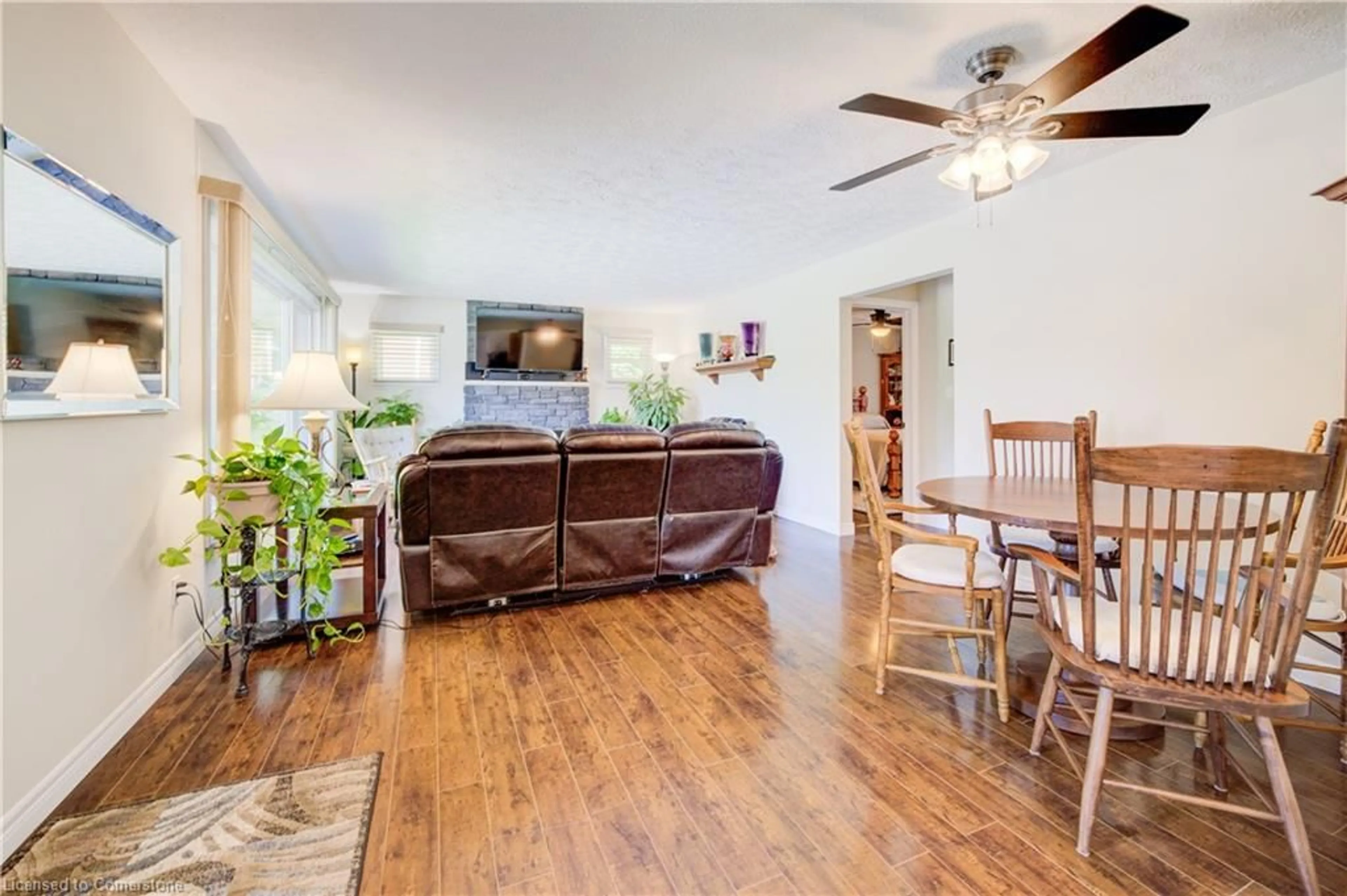 Living room with furniture, wood/laminate floor for 49 3rd St, Chesley Ontario N0G 1L0