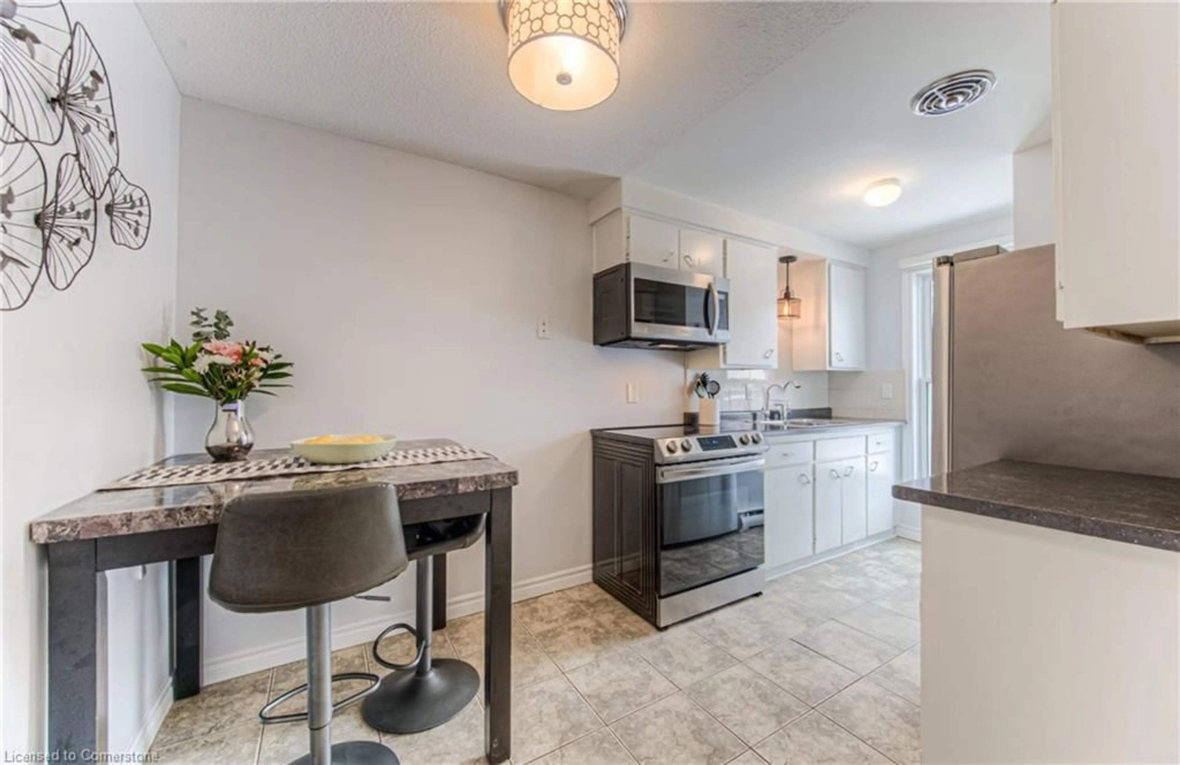 Open concept kitchen, ceramic/tile floor for 35 Breckenridge Dr #23, Kitchener Ontario N2B 3H5