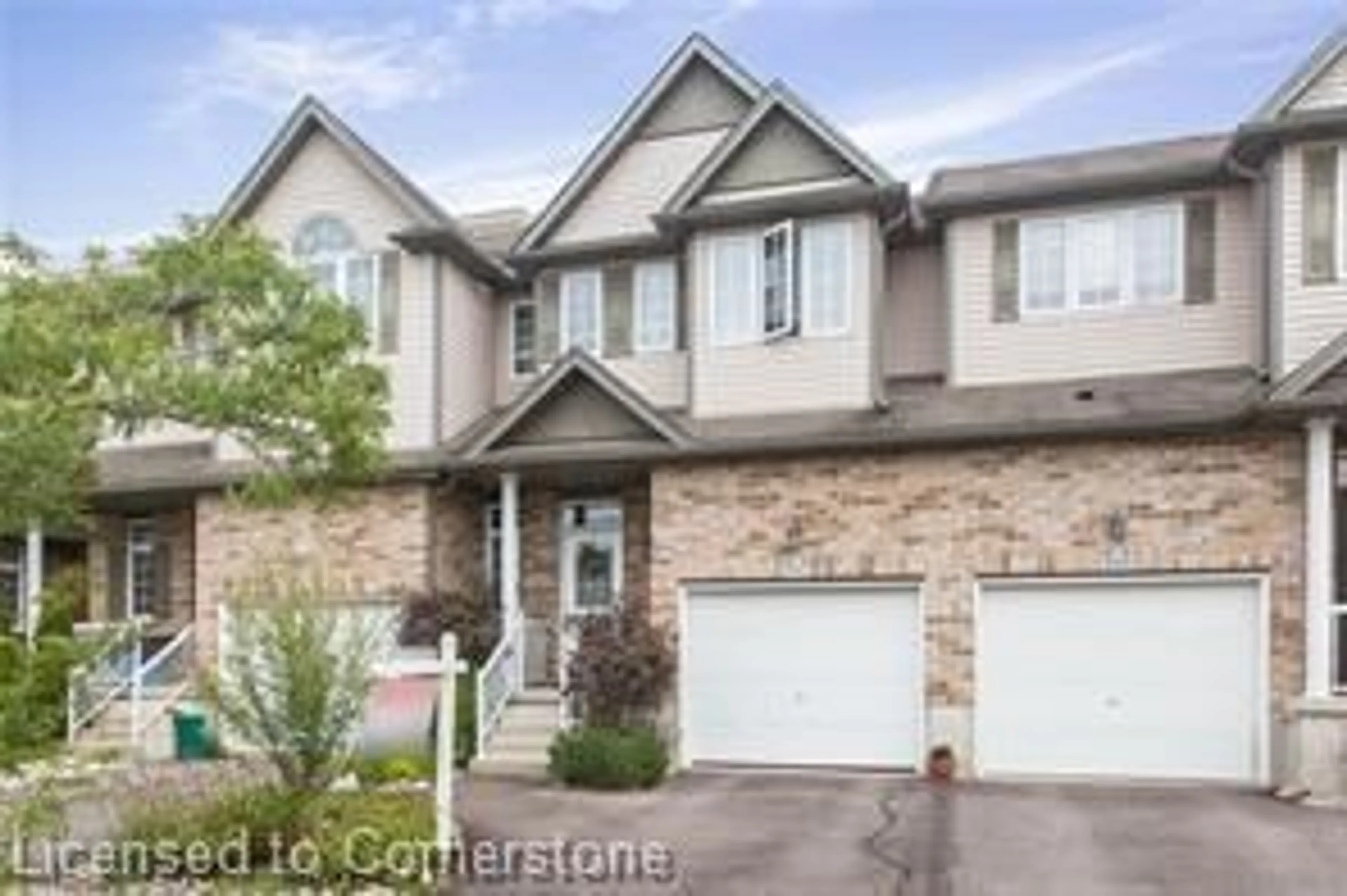 Home with brick exterior material, street for 987 Creekside Dr, Waterloo Ontario N2V 2W3
